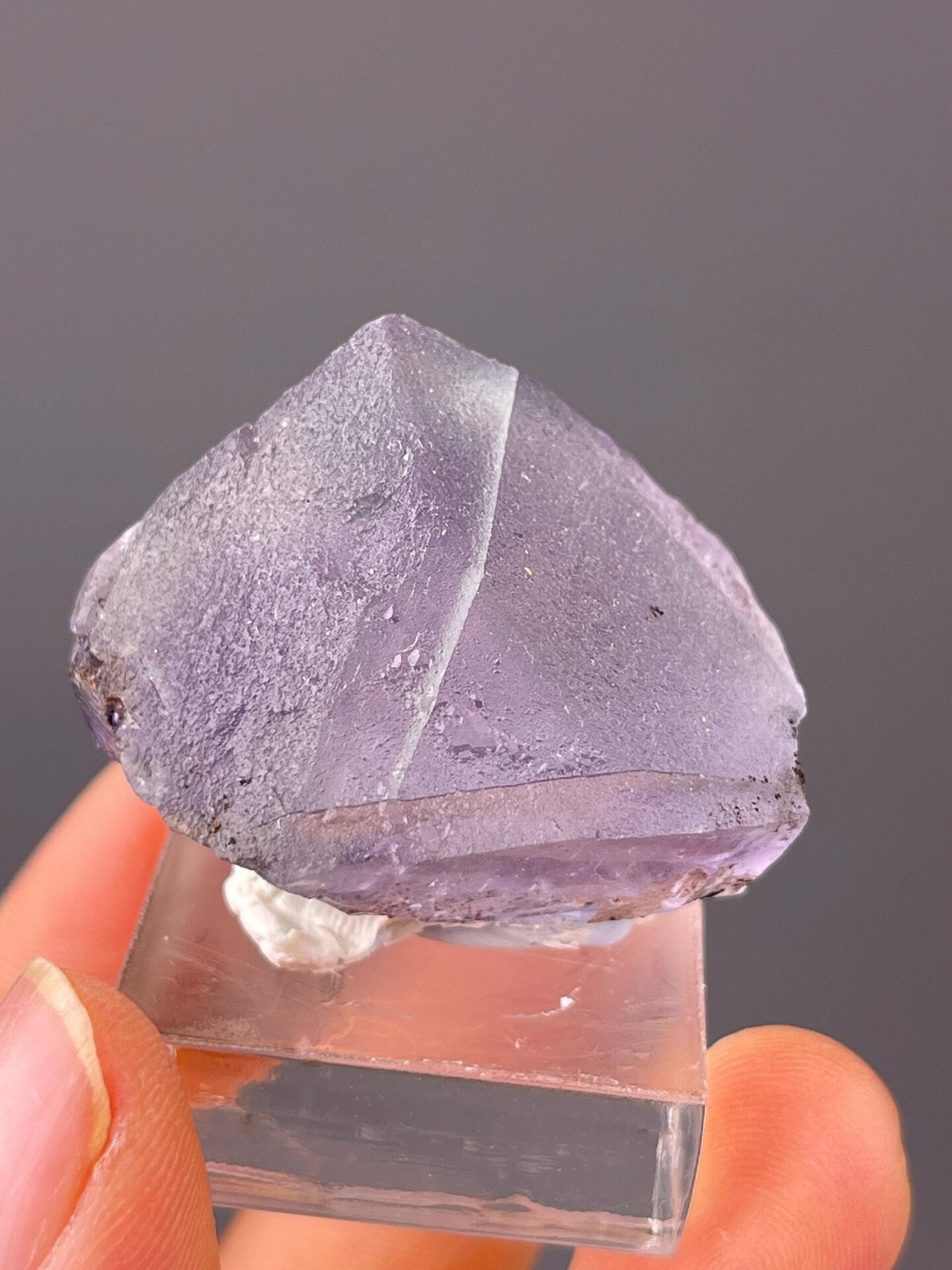 Fluorite with natural dissolution etching in octahedral form