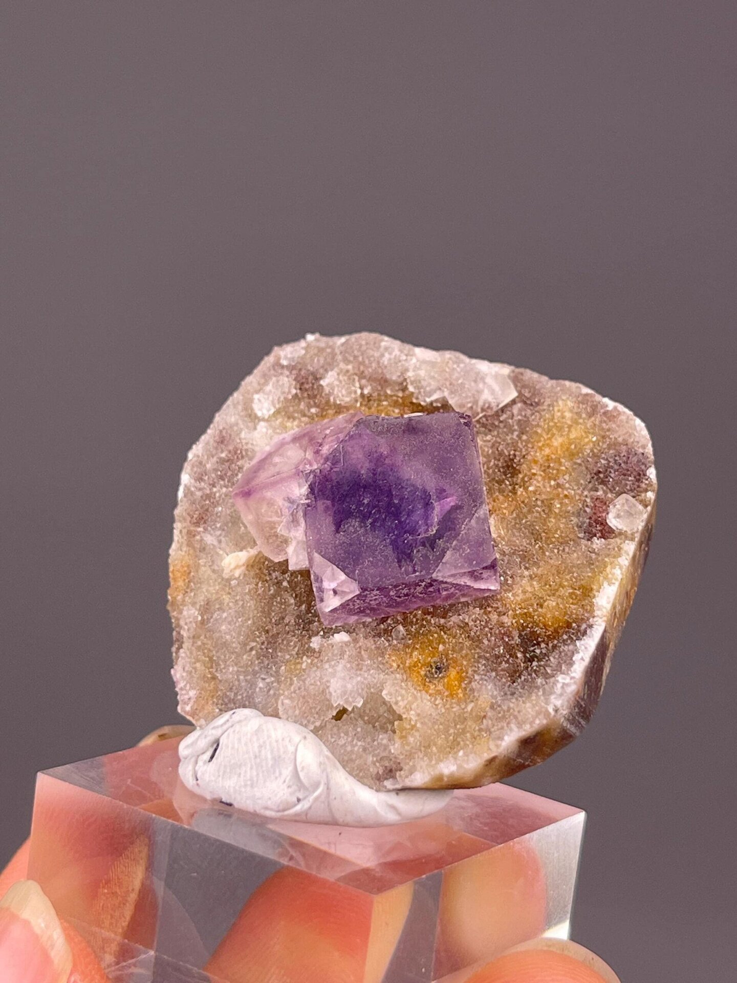 Translucent purple fluorite cube with internal phantom structure