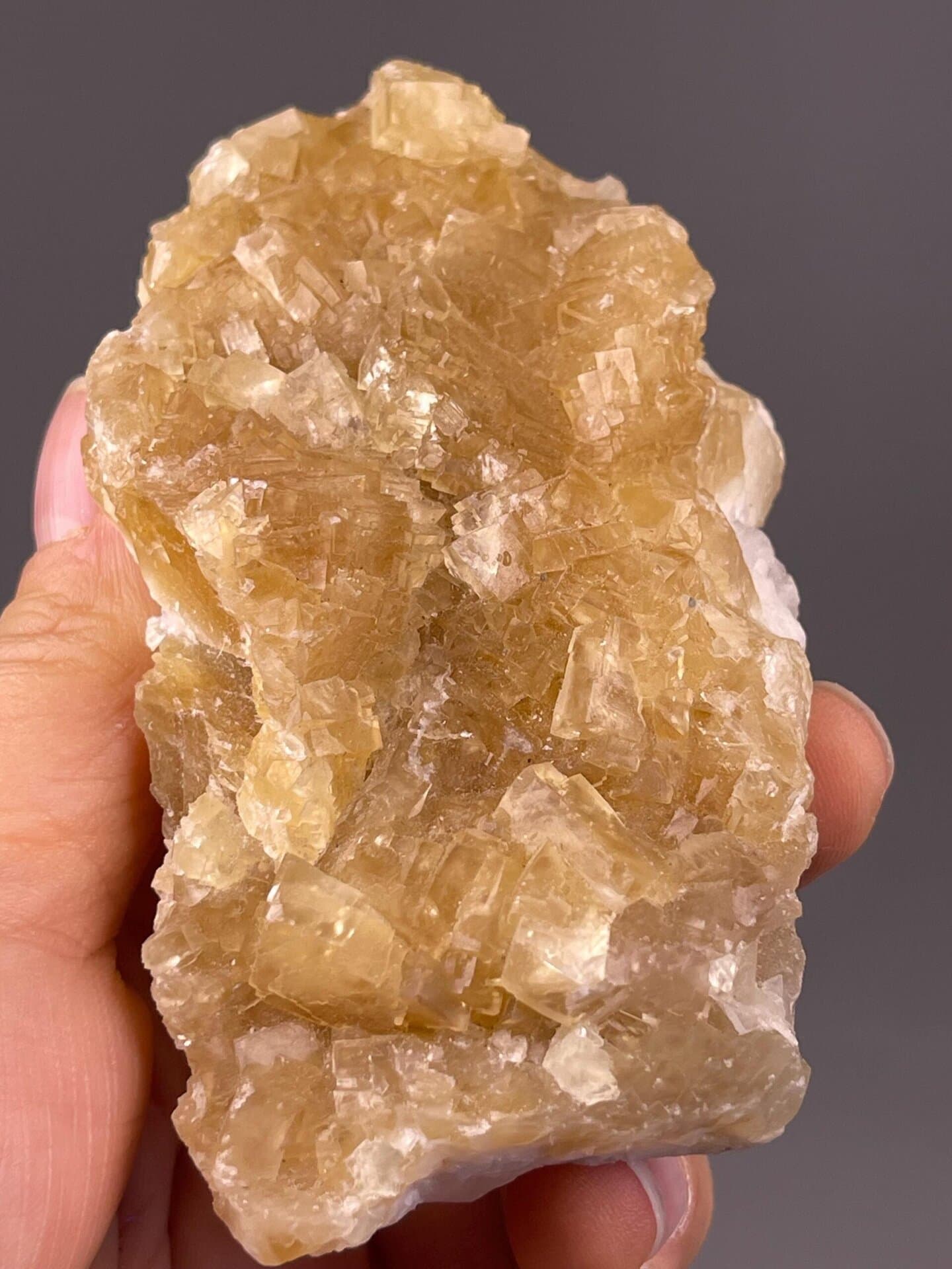 Yellow CaF₂ fluorite cluster with sharp cubic crystal faces