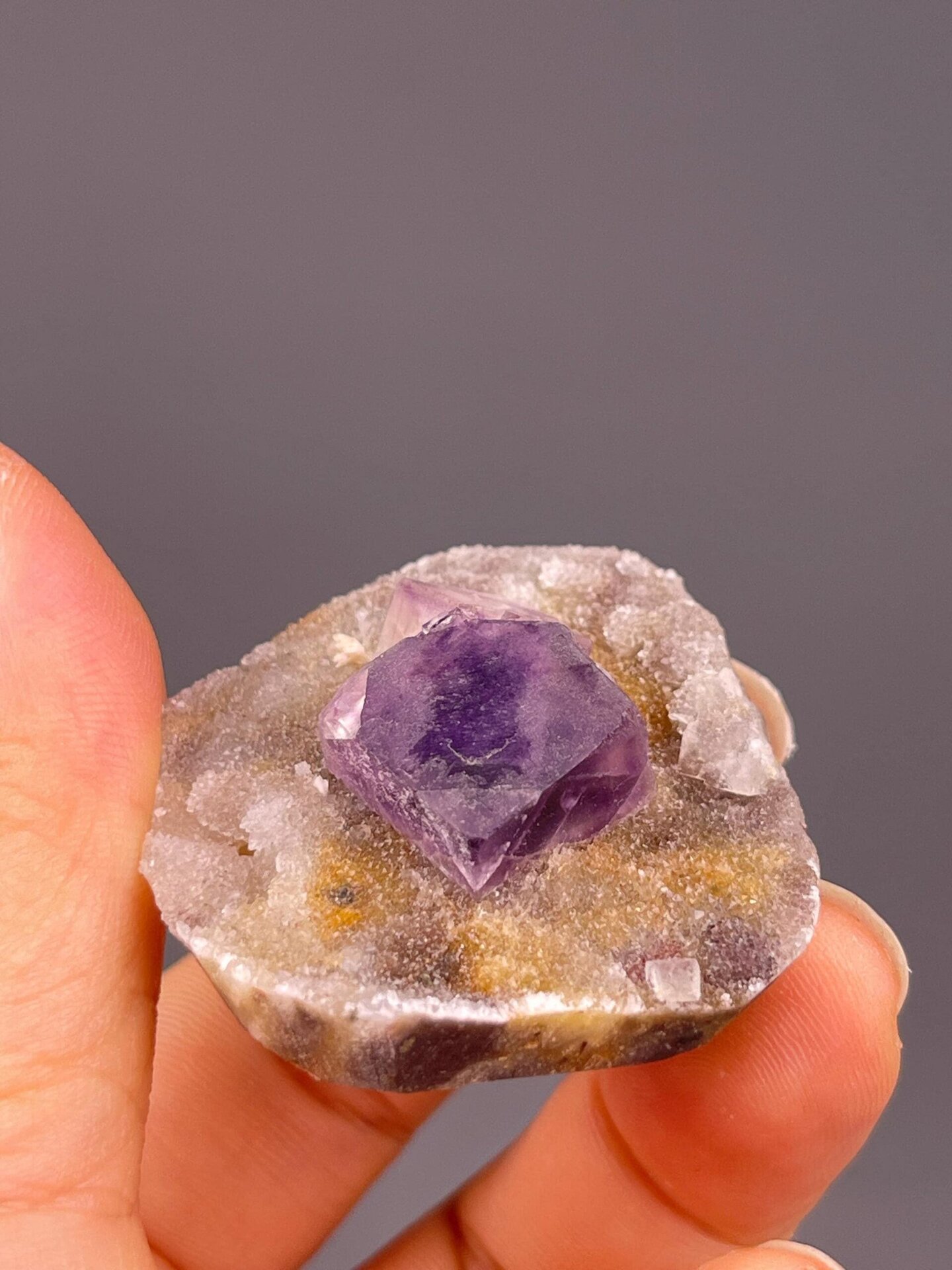 Purple fluorite cubic crystal with phantom growth record