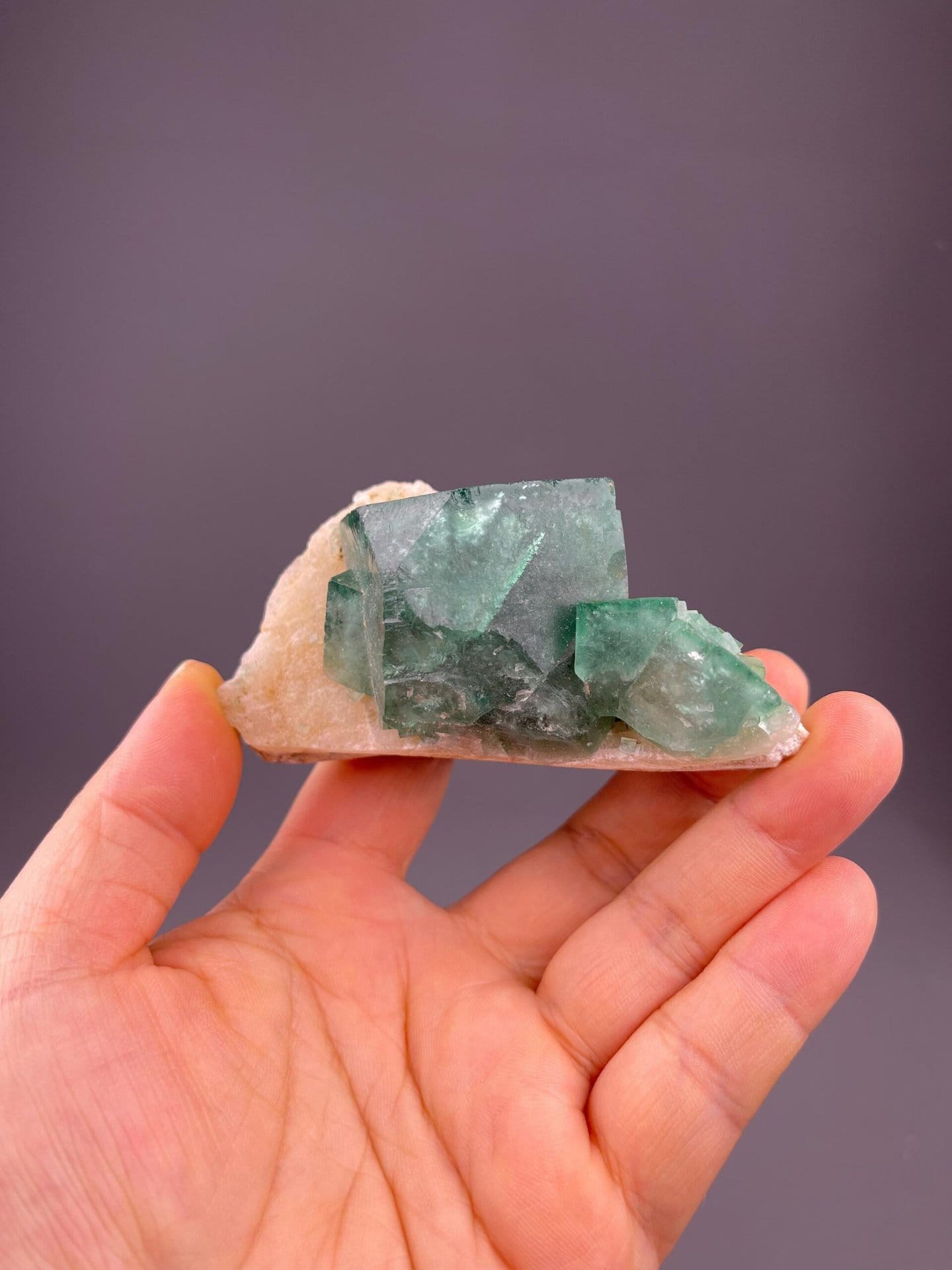 Side view of green fluorite cubic crystal Madagascar