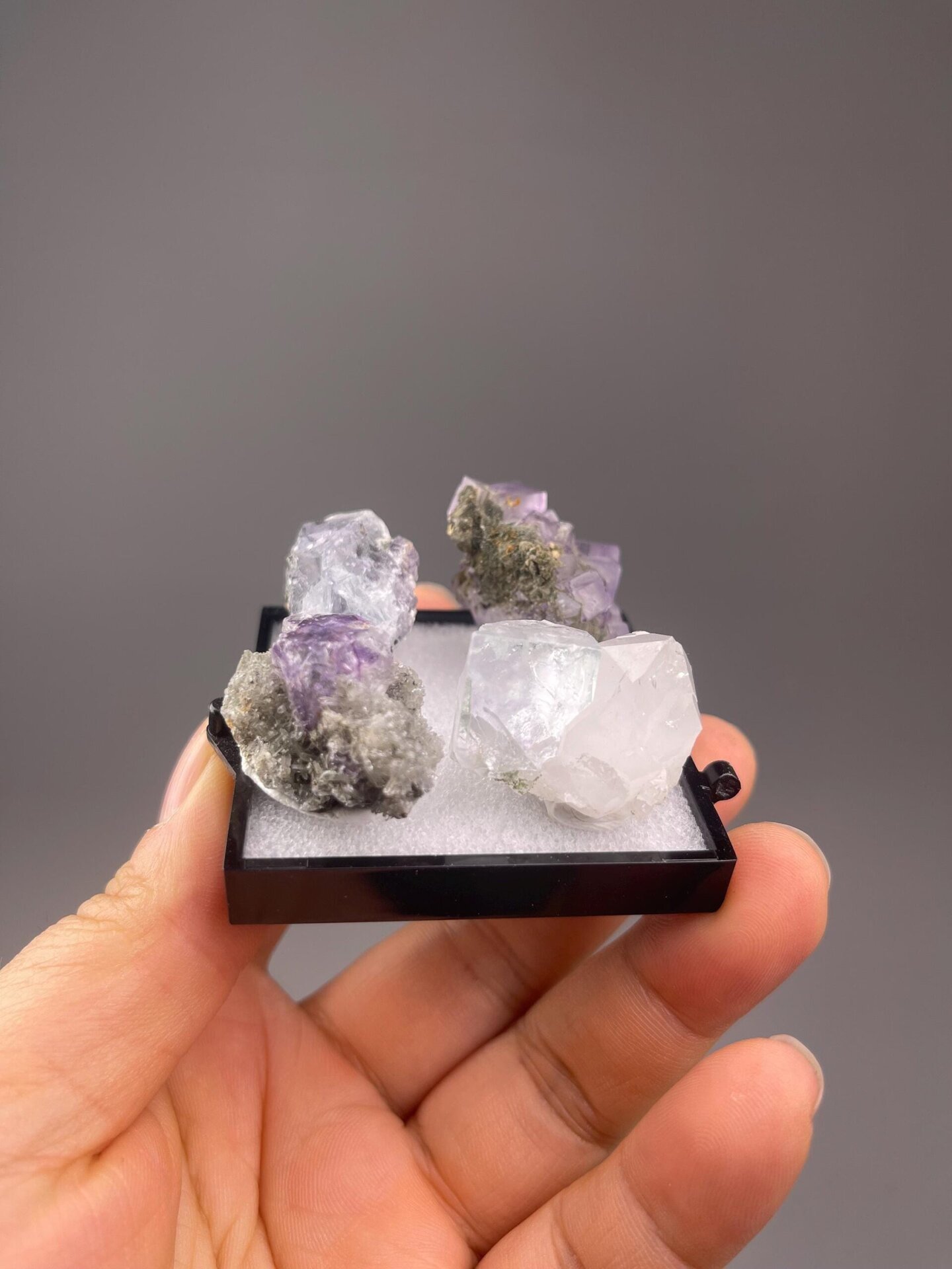 Side view of four-piece purple fluorite Yaogangxian set