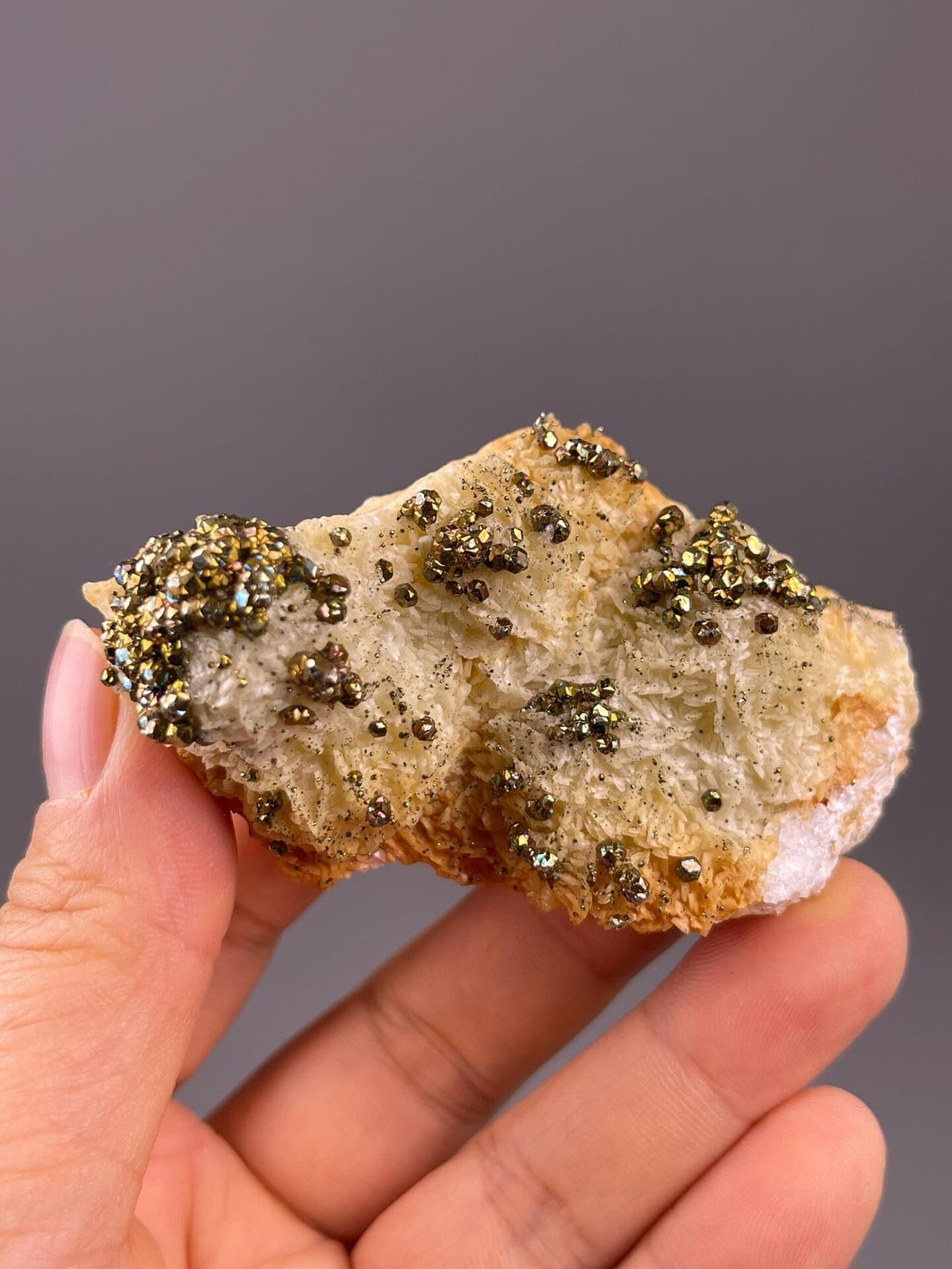 Iridescent chalcopyrite color on pyrite matrix