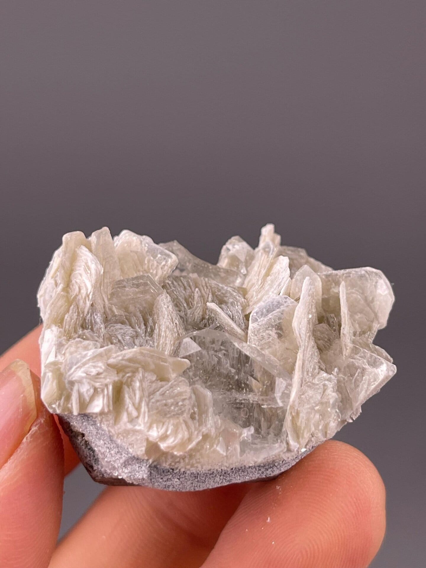 Angled view of aquamarine beryl on mica matrix