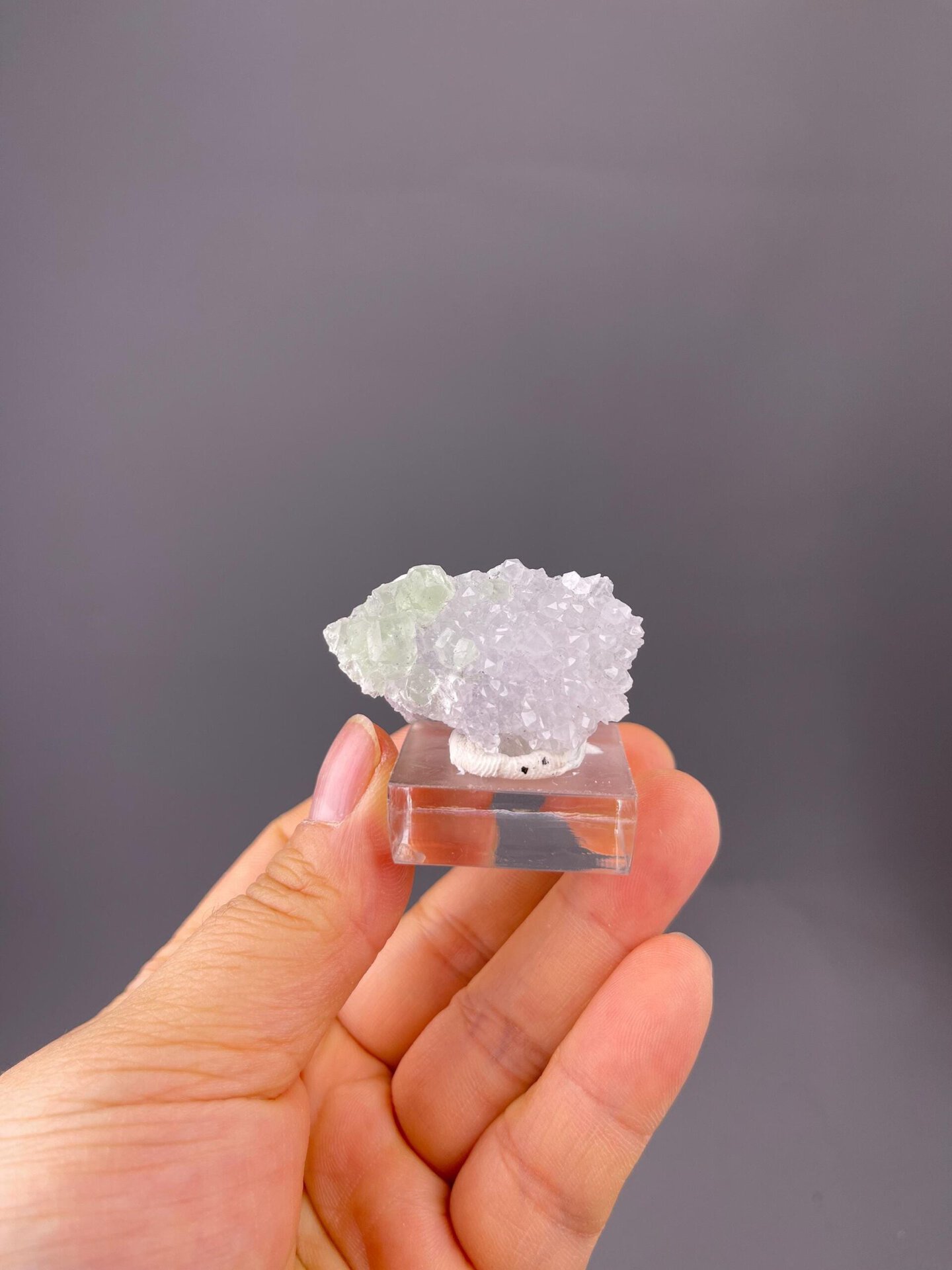 Close-up of green fluorite crystals on matrix