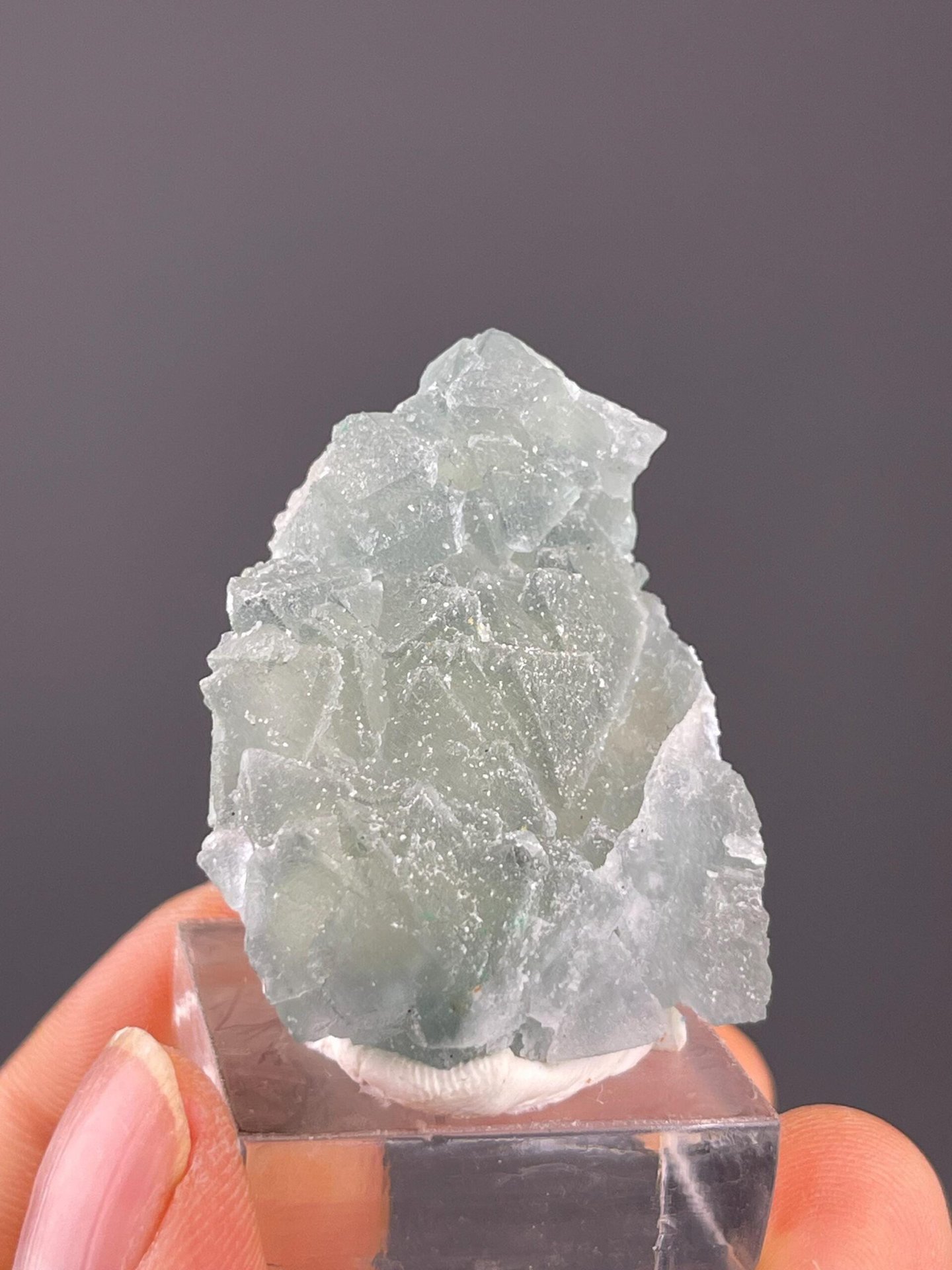 Microcrystalline sugar-like coating on green fluorite