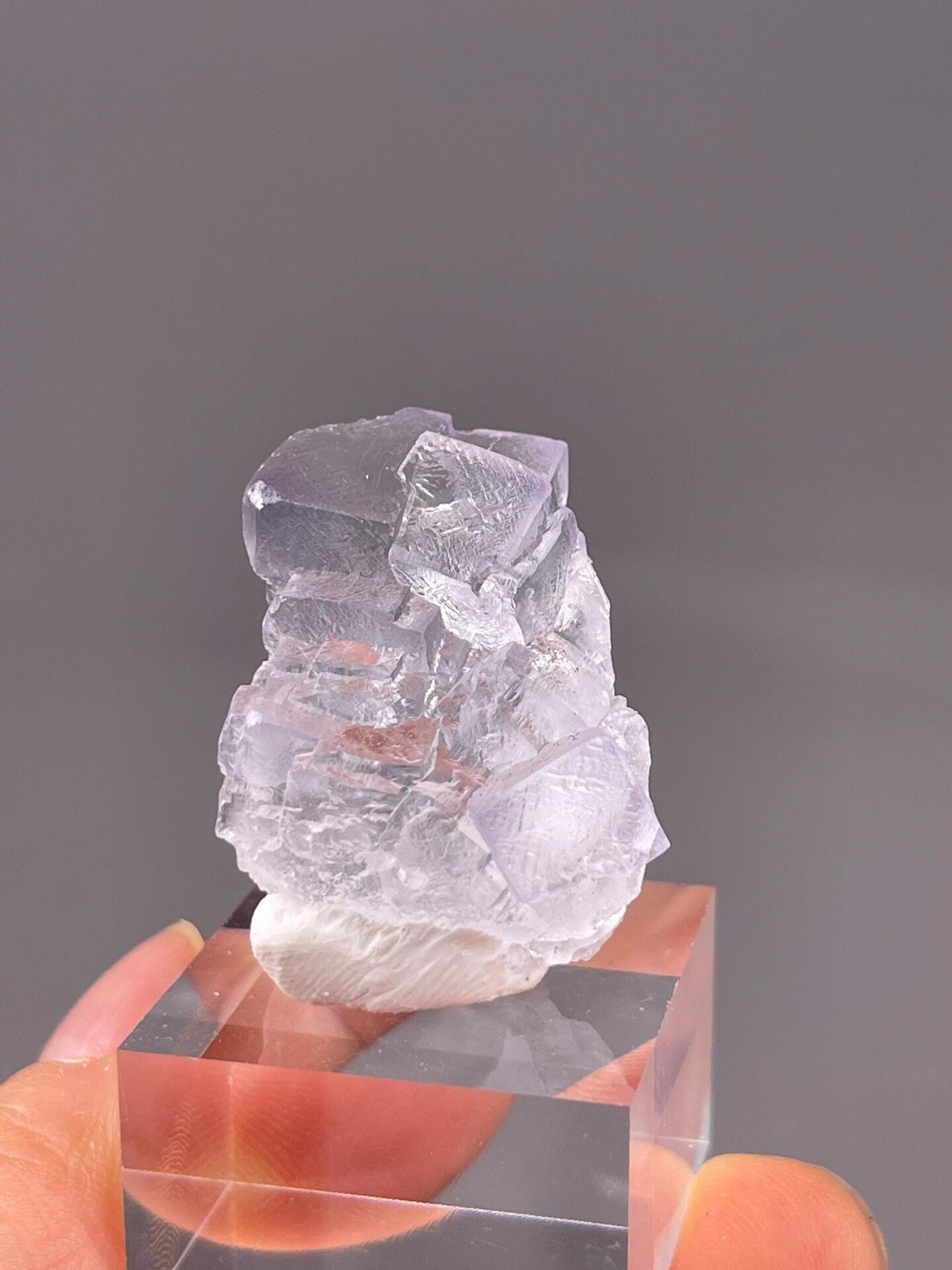 Transparent fluorite with dissolved etched surface texture