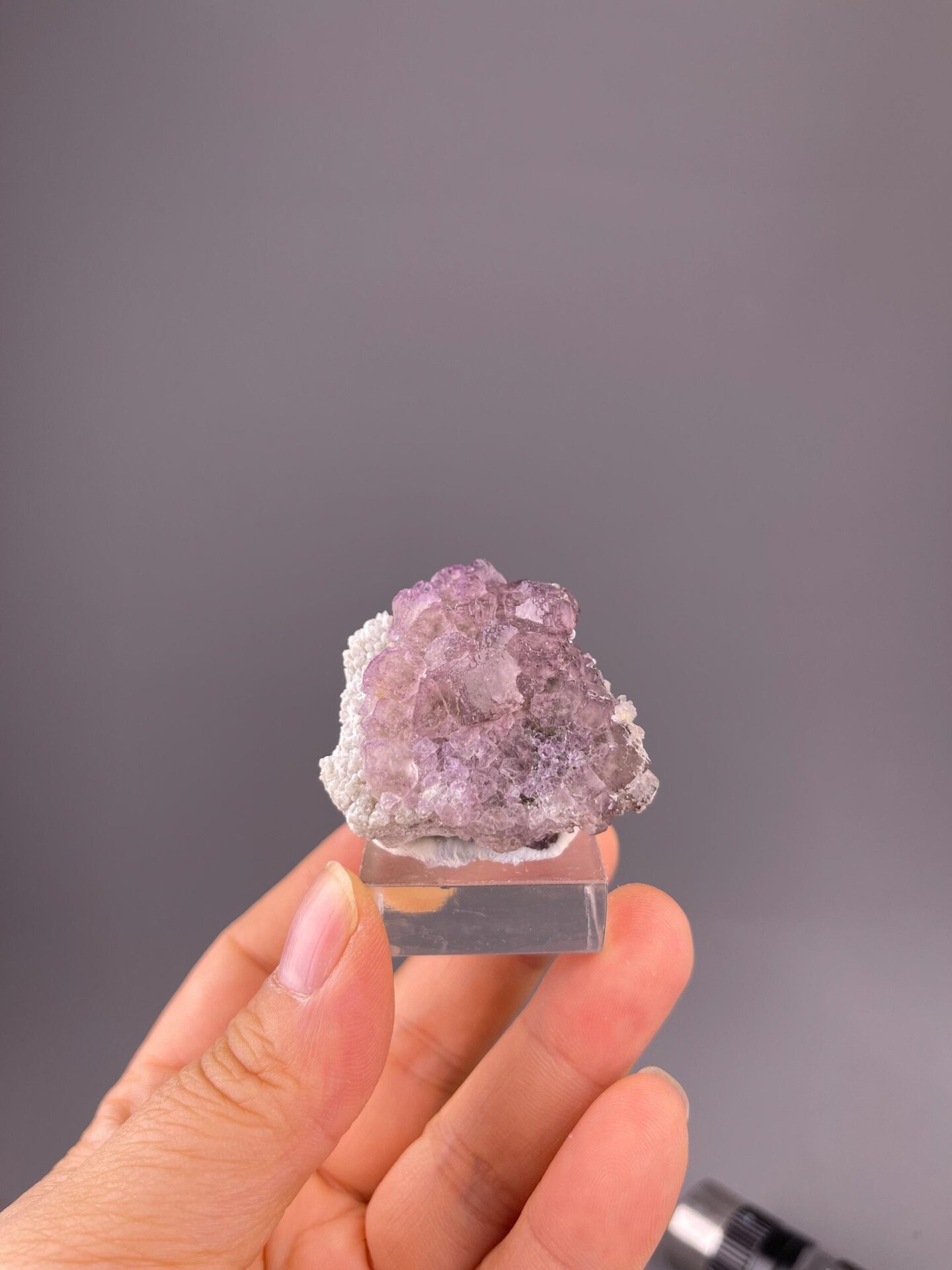 Deep purple fluorite elongated crystal faces close-up