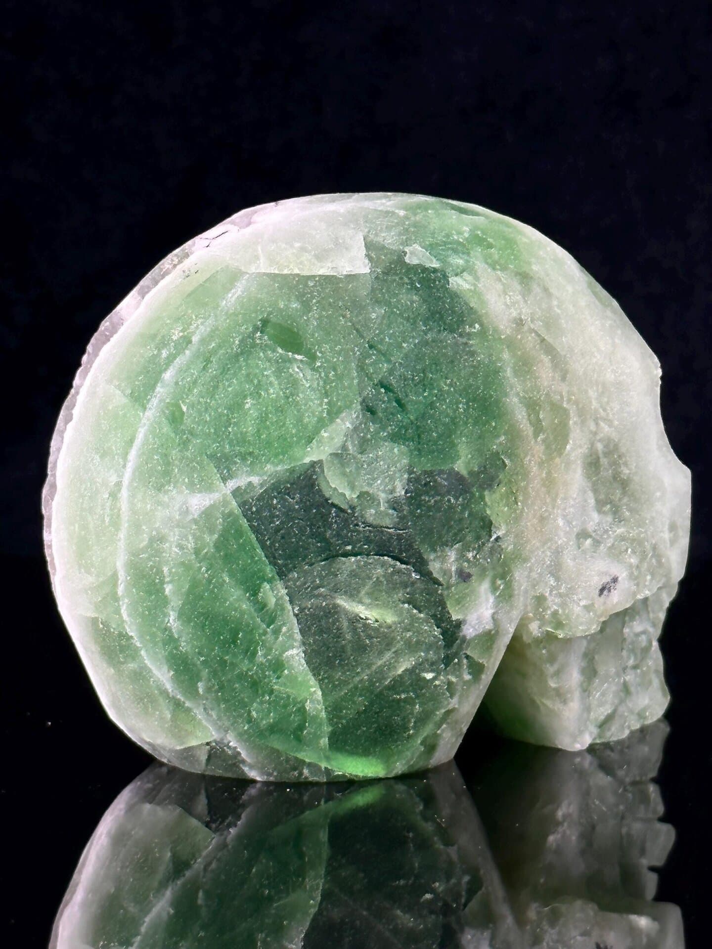 Fluorite skull carving showing natural crystal interior