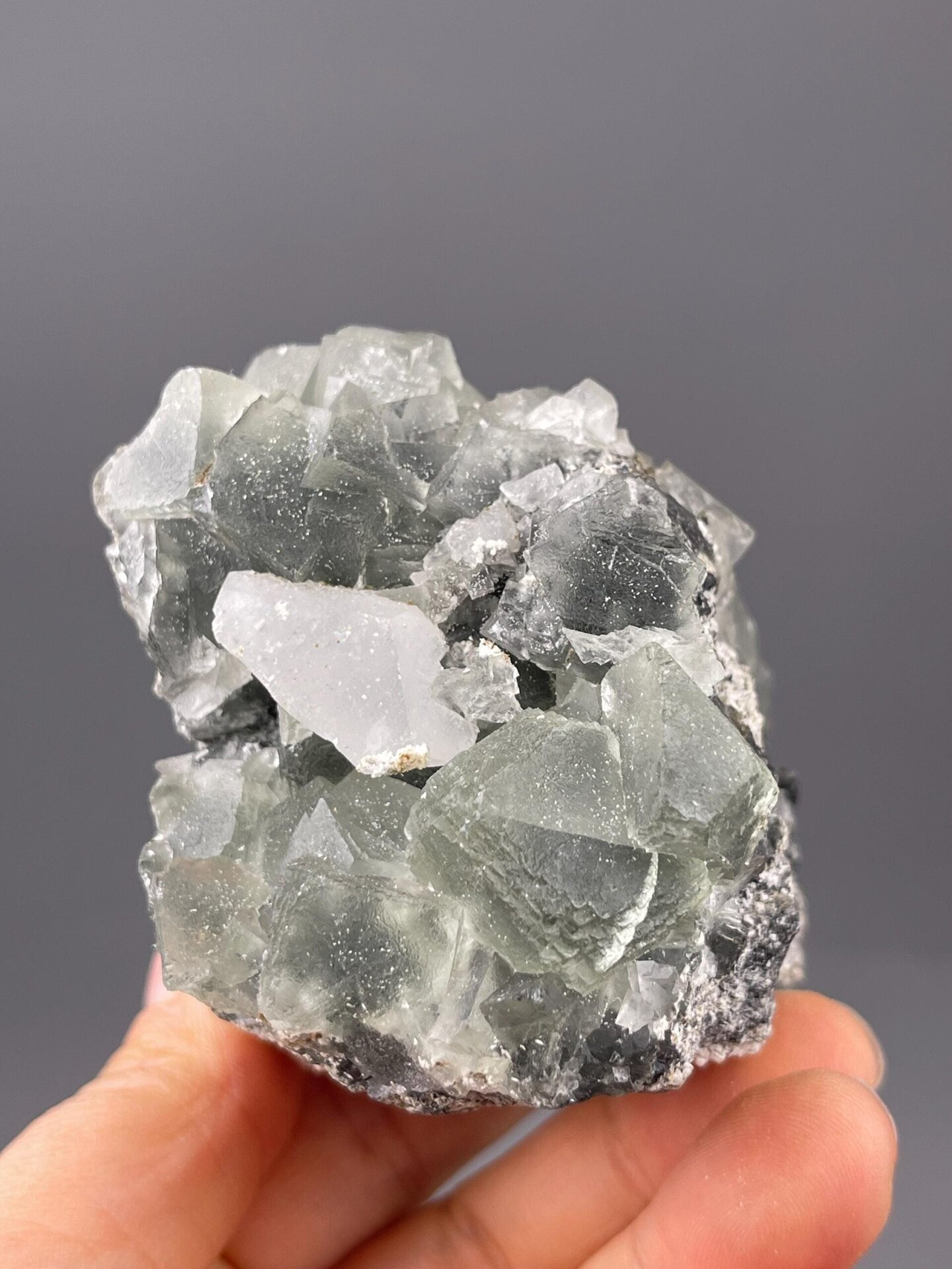 Cubic green fluorite crystal faces luster detail
