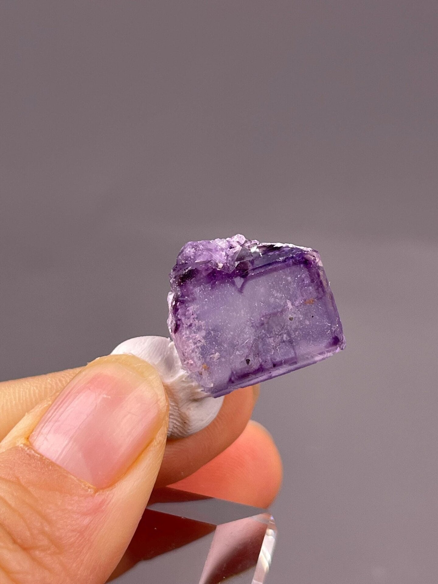 Green fluorite crystal faces inclusions detail