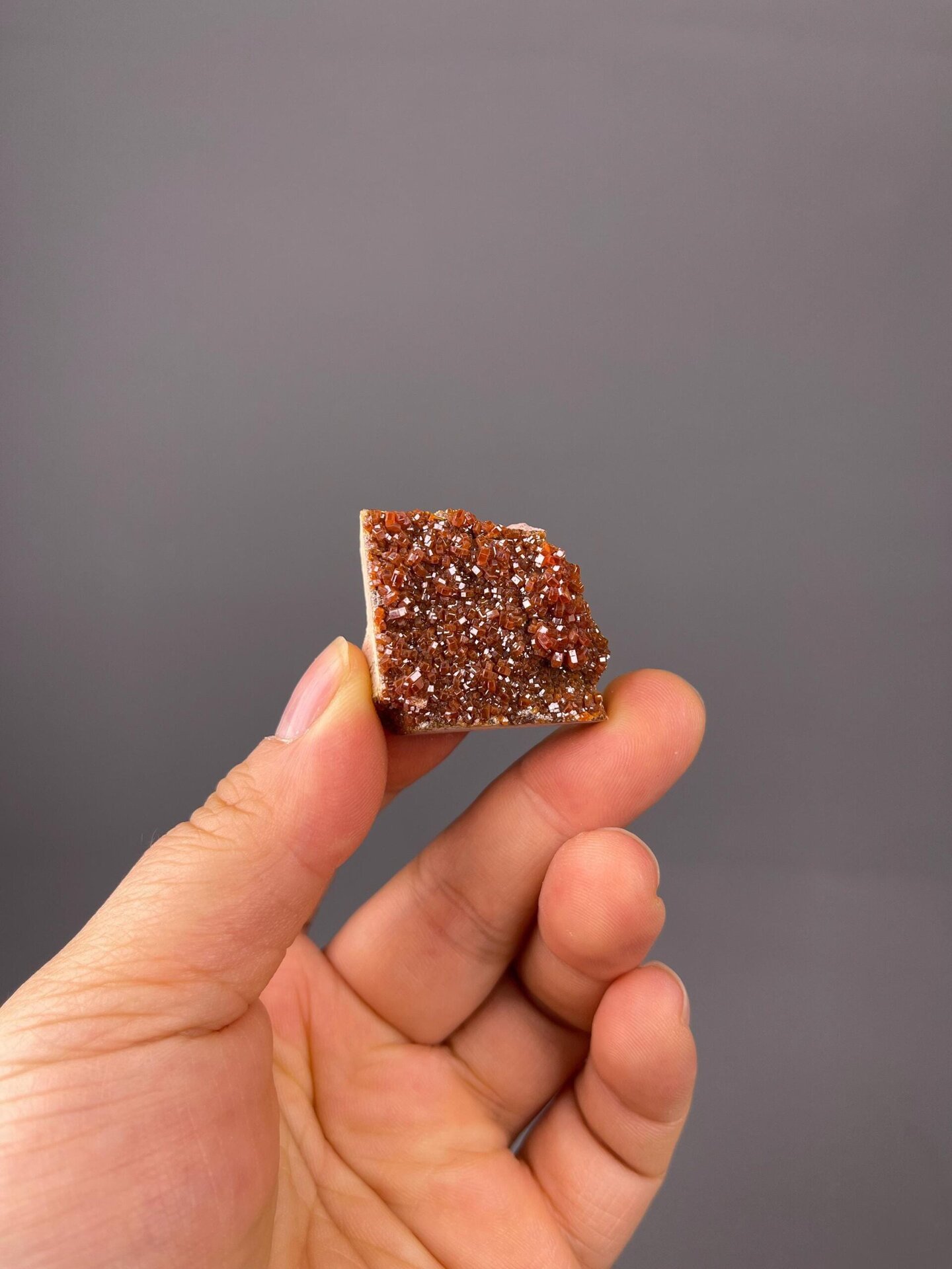 Red hexagonal vanadinite crystals close-up