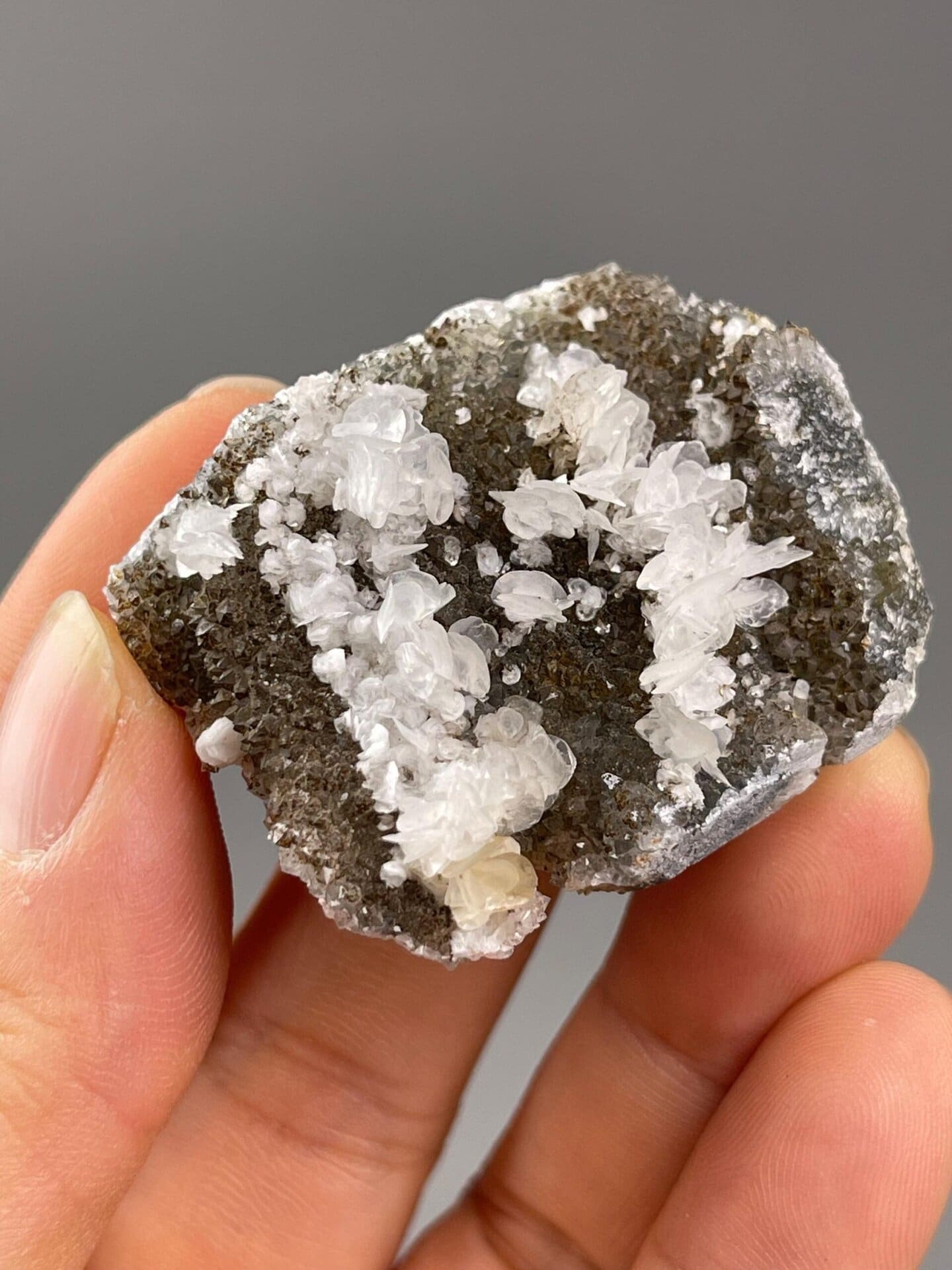 Lustrous calcite crystals with quartz close-up