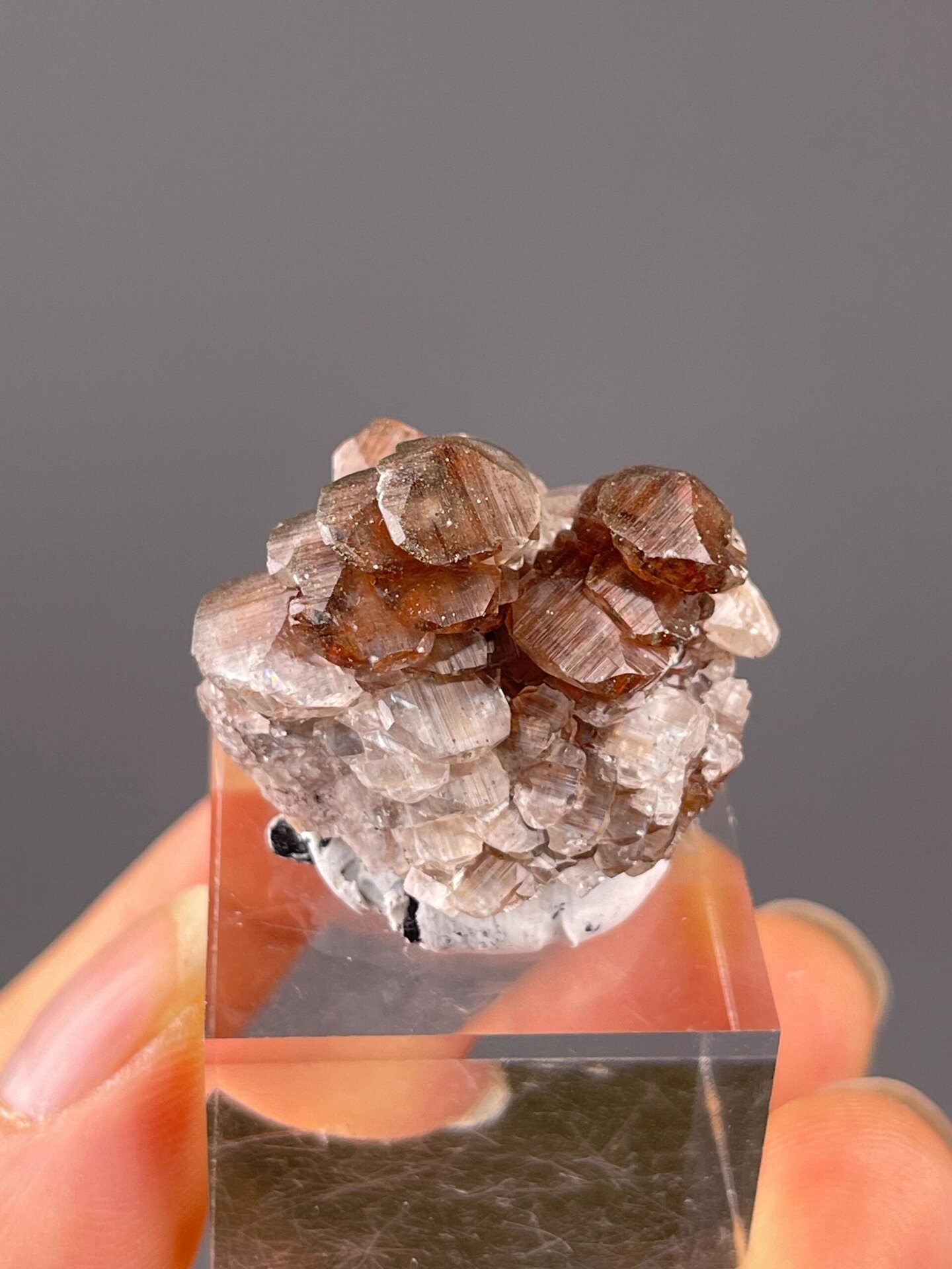 Red calcite stepped layered surface detail