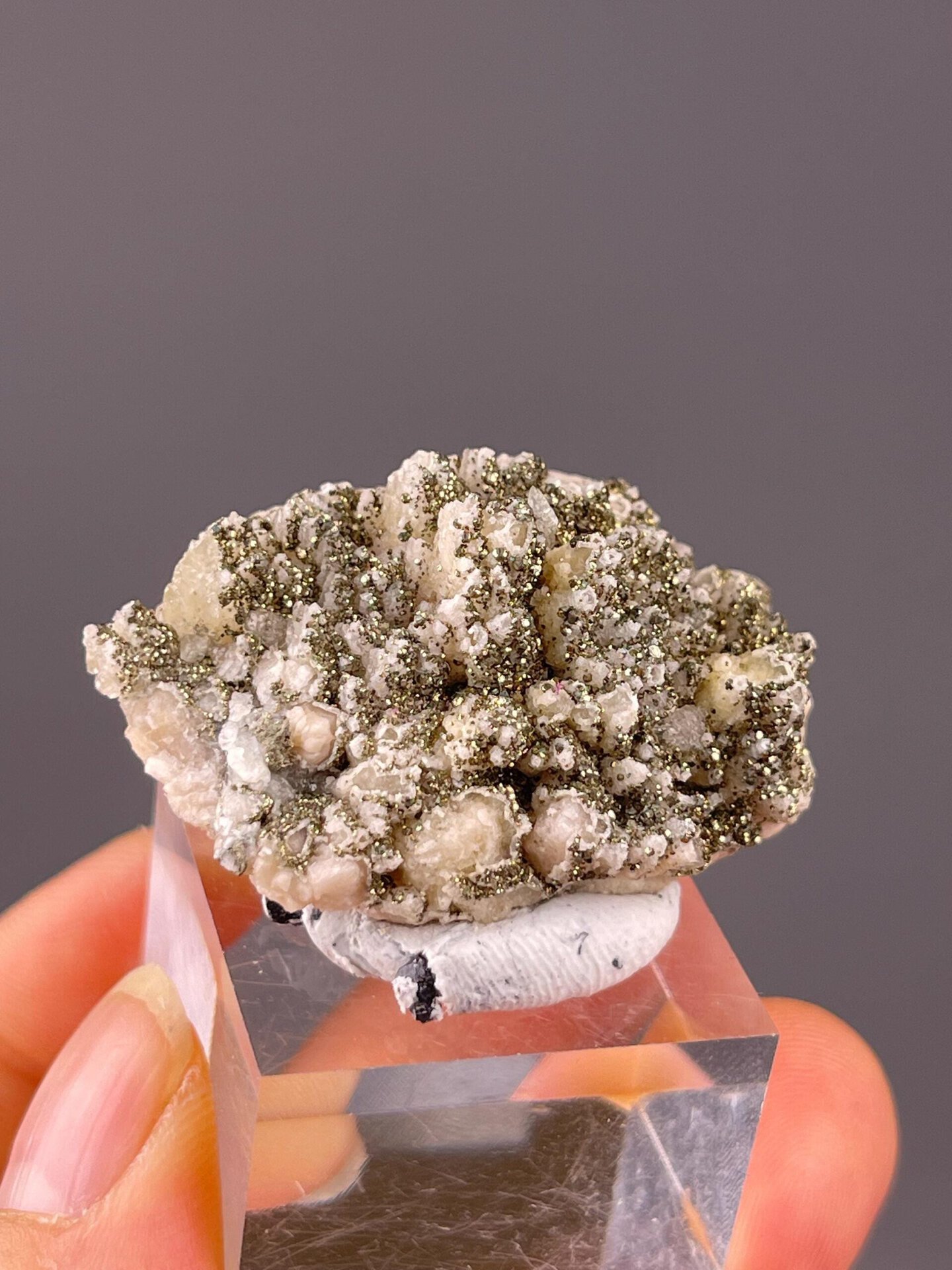 Metallic pyrite crystal faces on dolomite detail