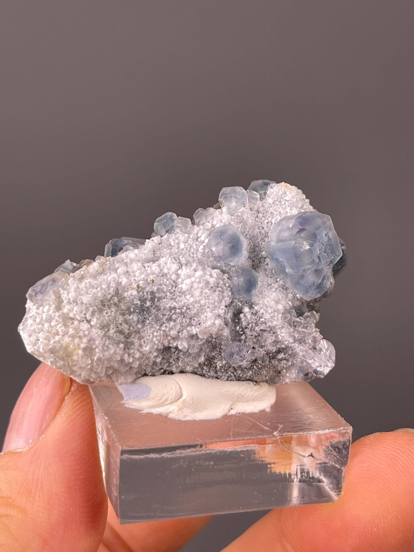 Front view of tanzanite-blue fluorite cluster from Fujian