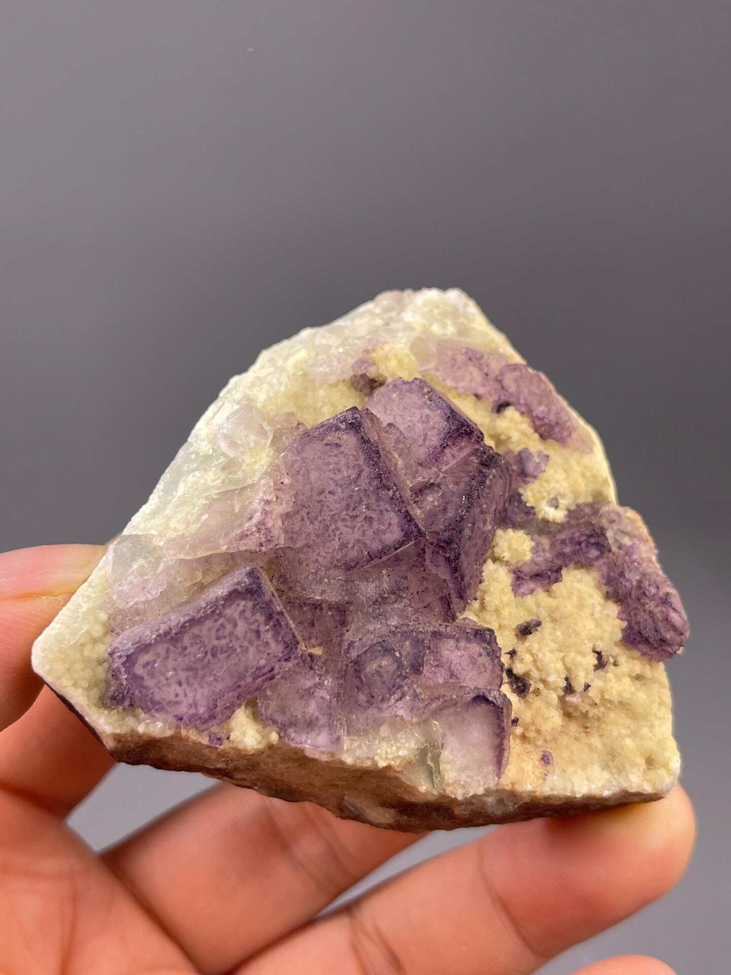 Purple fluorite cluster from Guizhou China front view
