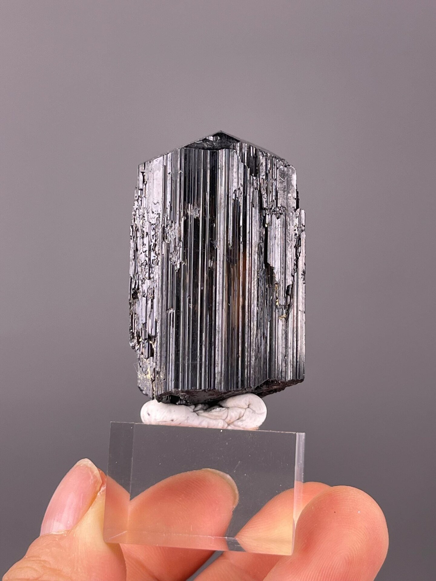 Front view of raw black tourmaline schorl crystal from China