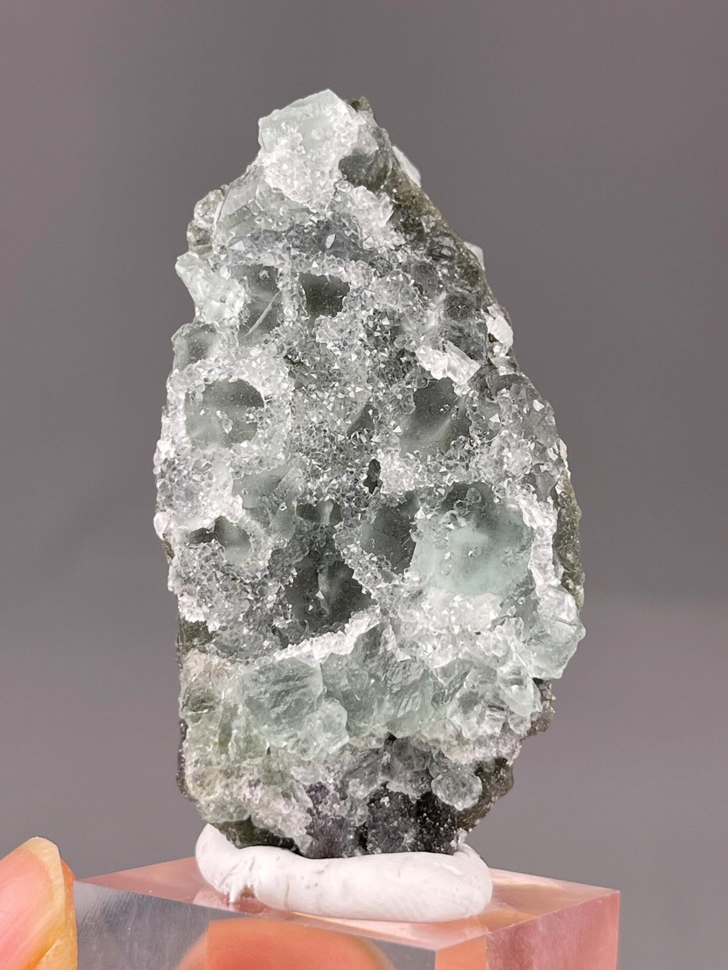 Side view of sugar-coated green fluorite cluster