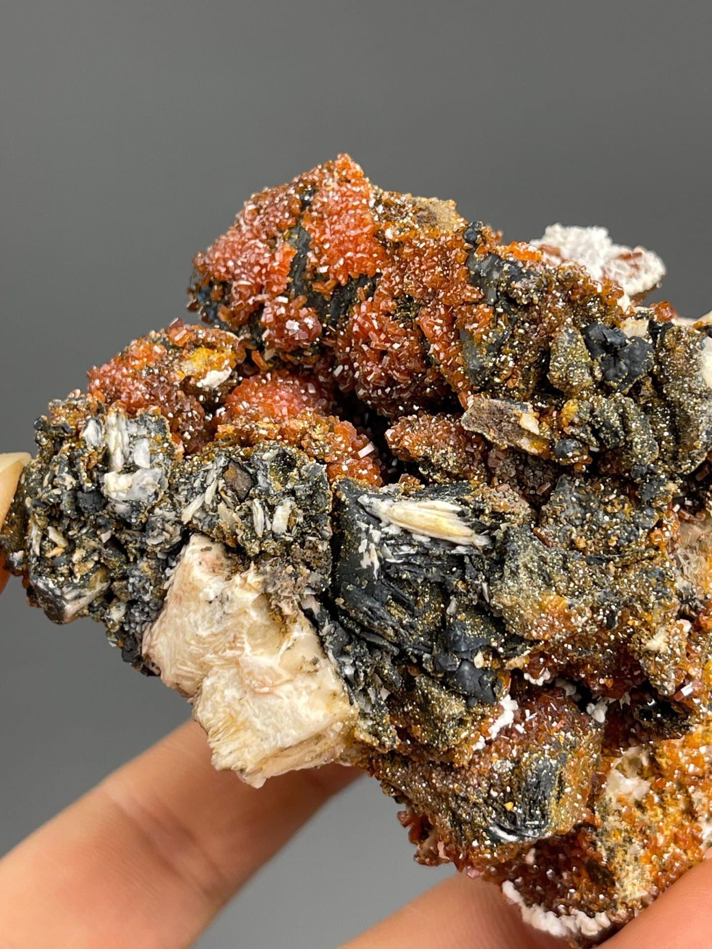 Side view of vanadinite and barite specimen from Morocco