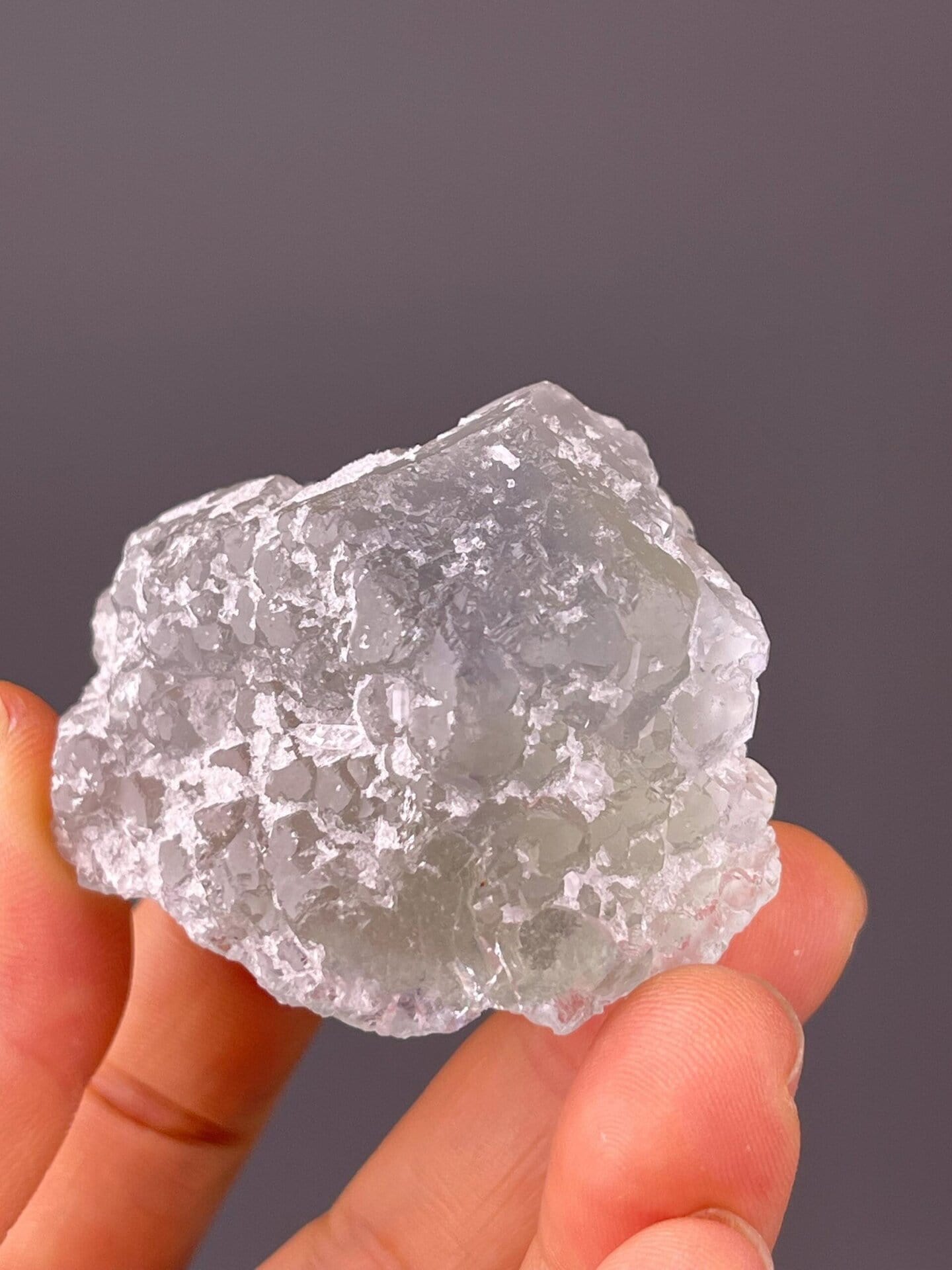 Green sugar fluorite under studio lighting