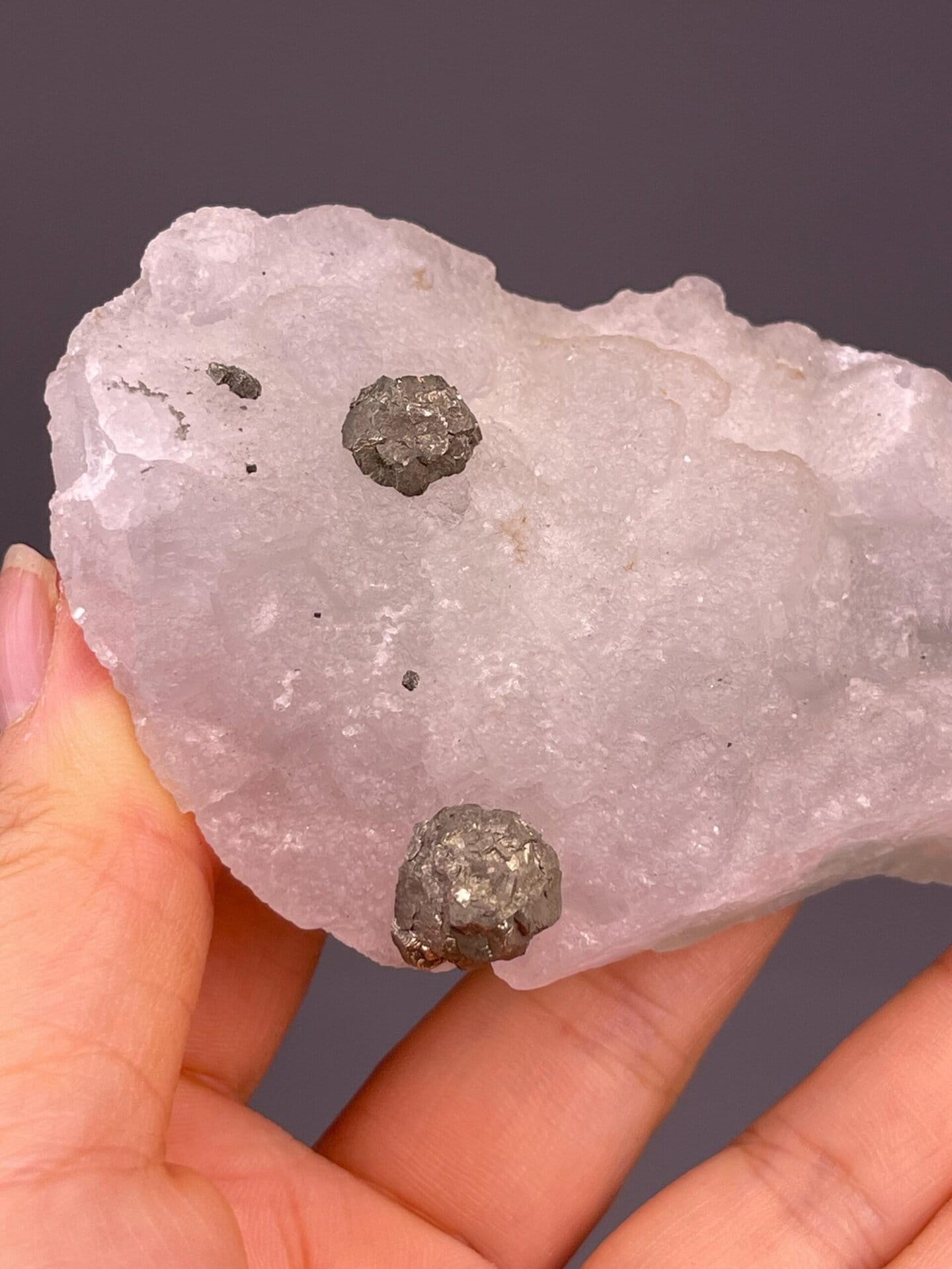 Green fluorite iron ore specimen under studio lighting