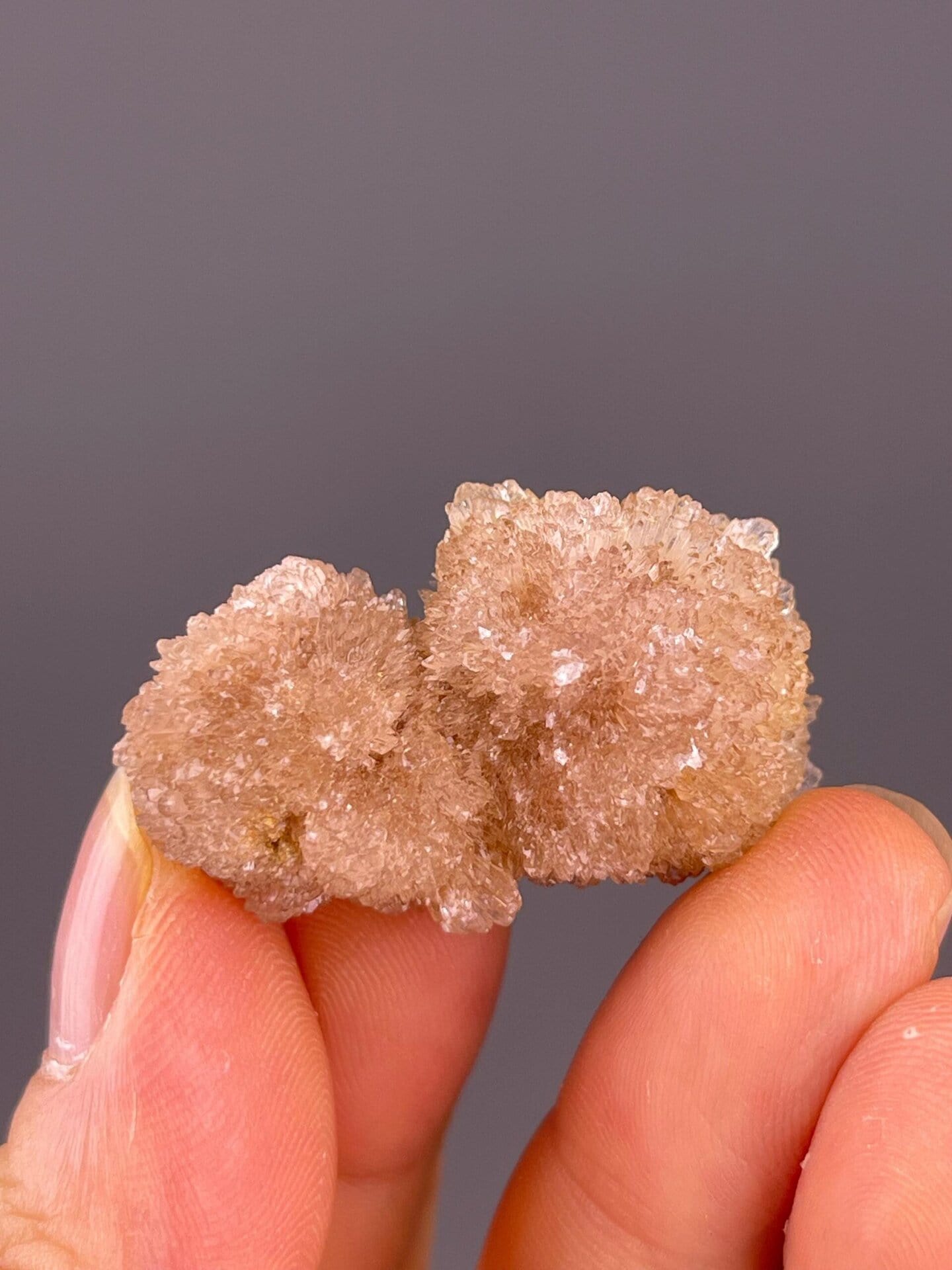 Silky luster on gypsum needle crystal surfaces