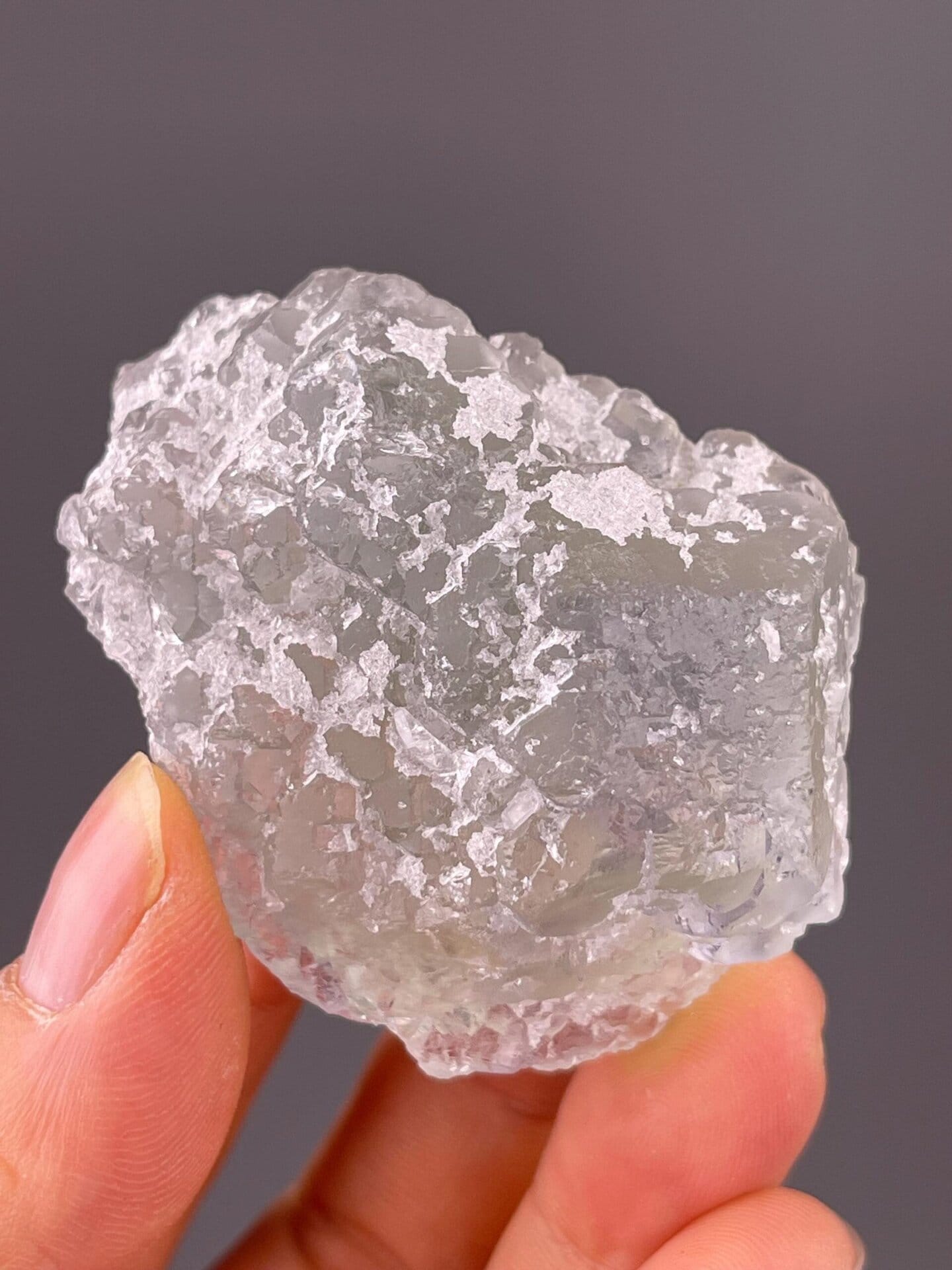 Sparkling layer of fine quartz on green fluorite