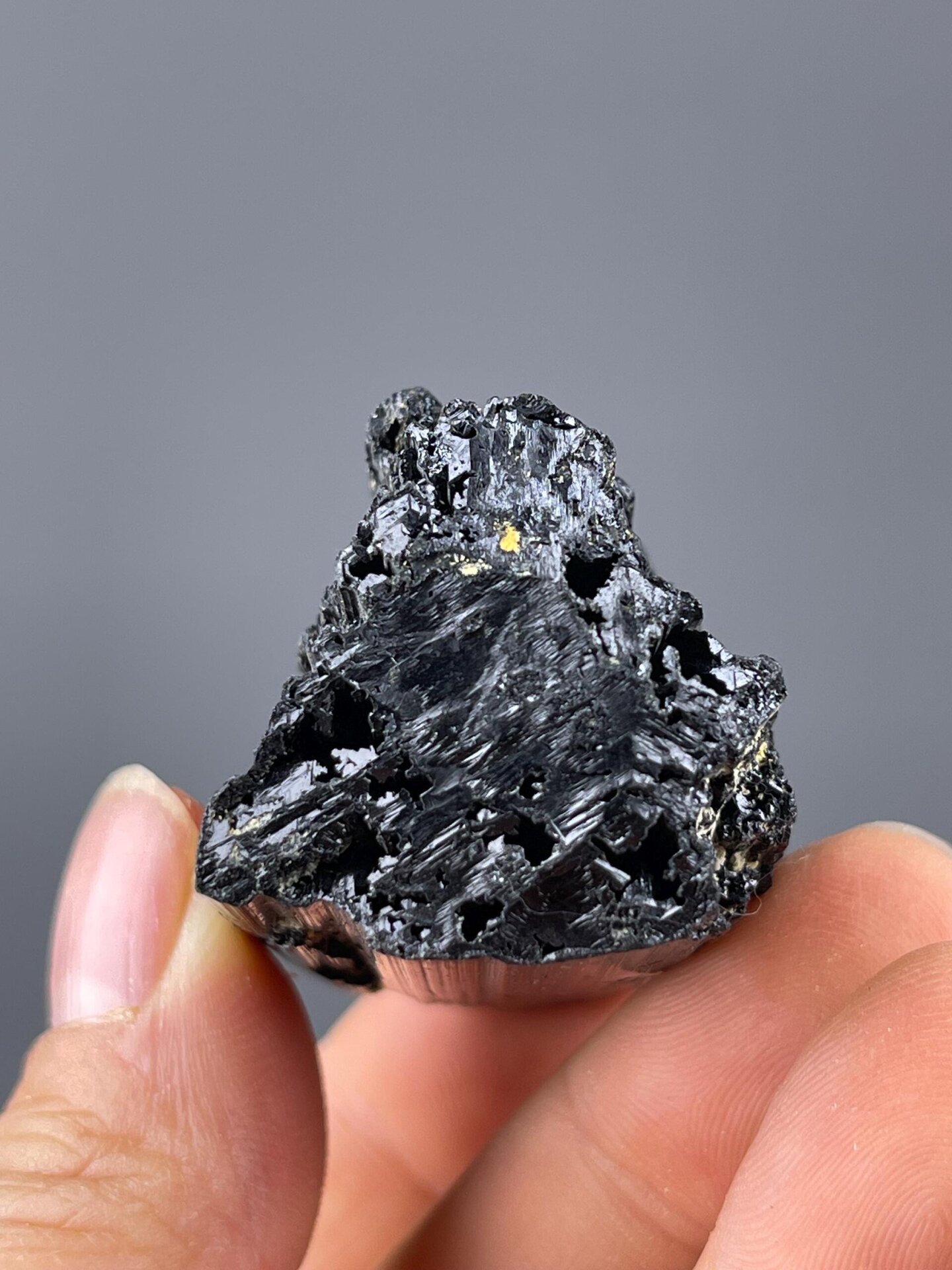 Vitreous luster on black tourmaline crystal faces