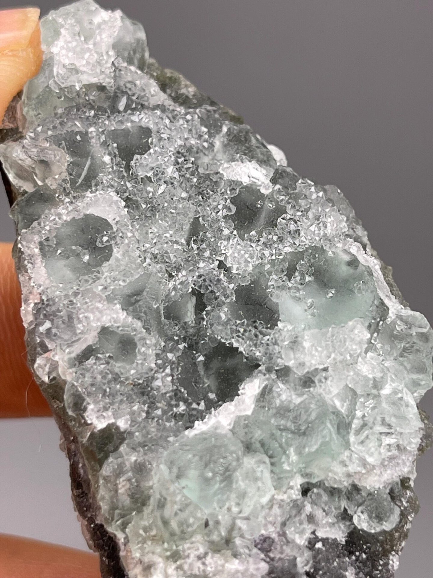 Scale reference of raw sugar-coated green fluorite from Fujian