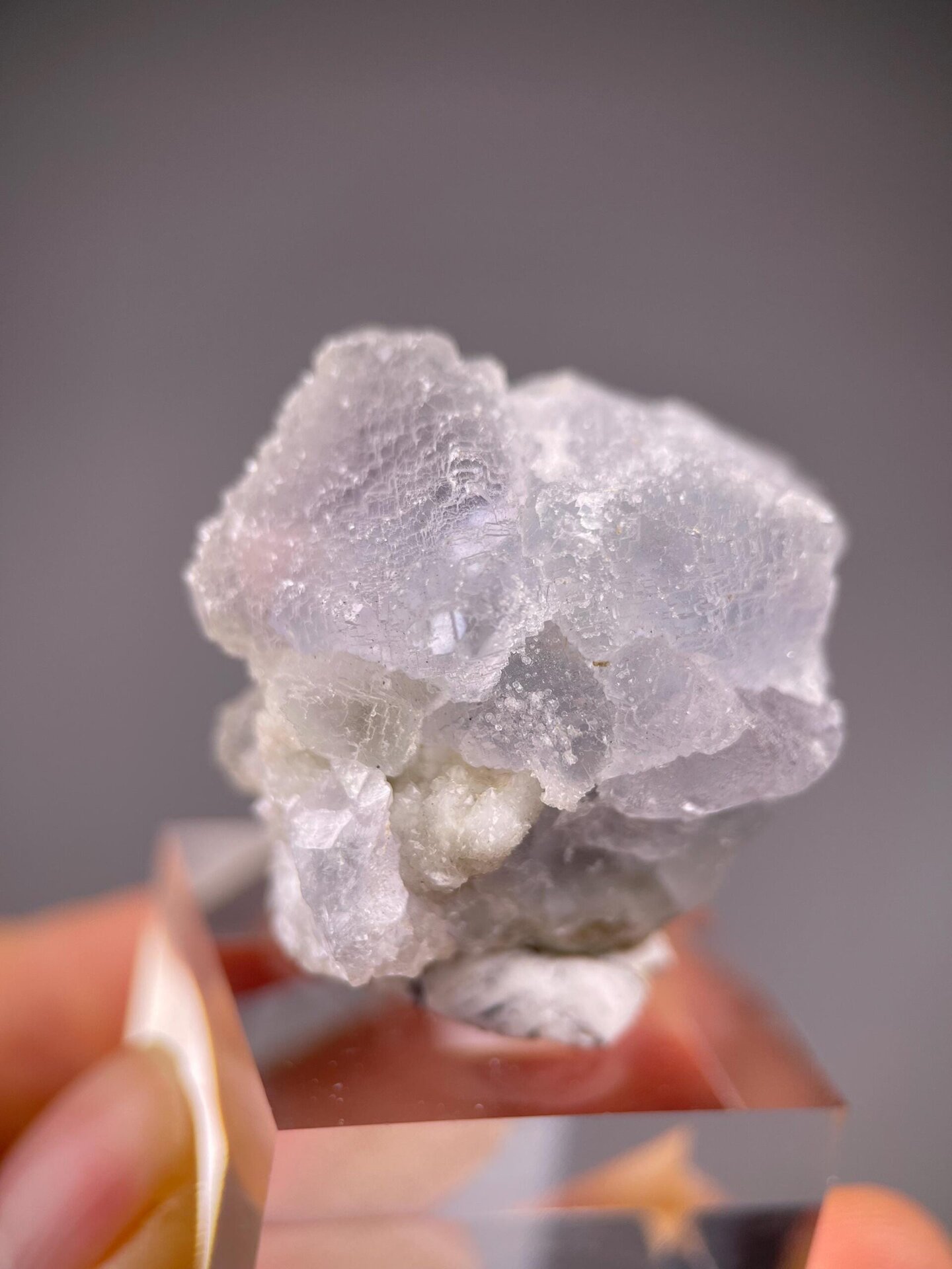 Multiple etched fluorite cubes with purple tints