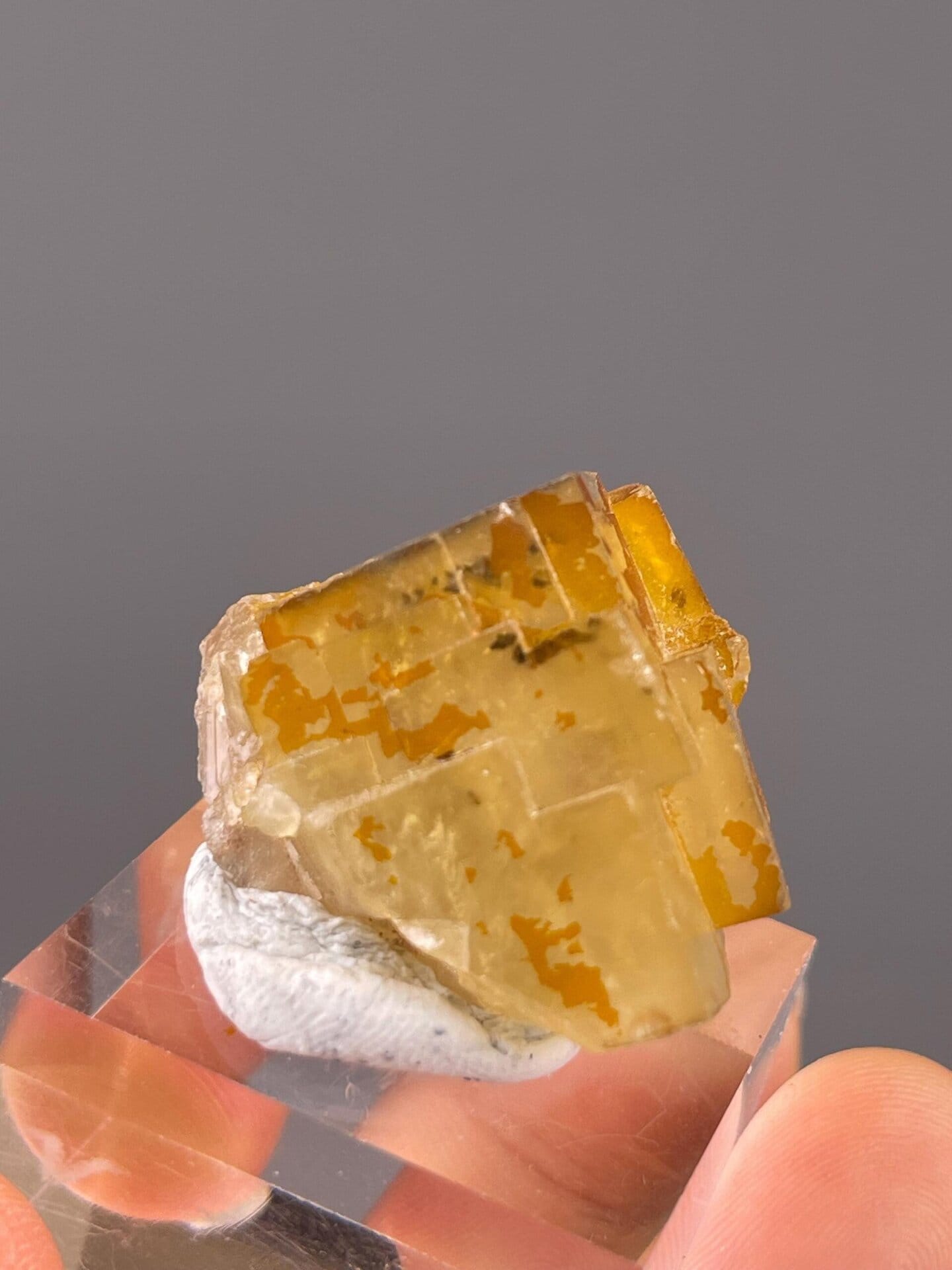 Vitreous luster on yellow fluorite cube faces