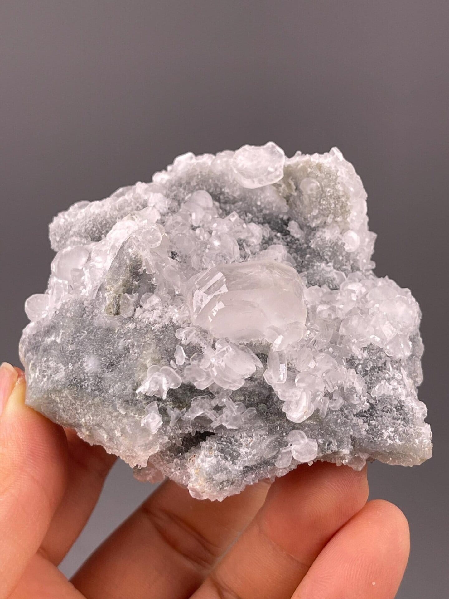 Front view of pink mangano calcite cluster from Peru