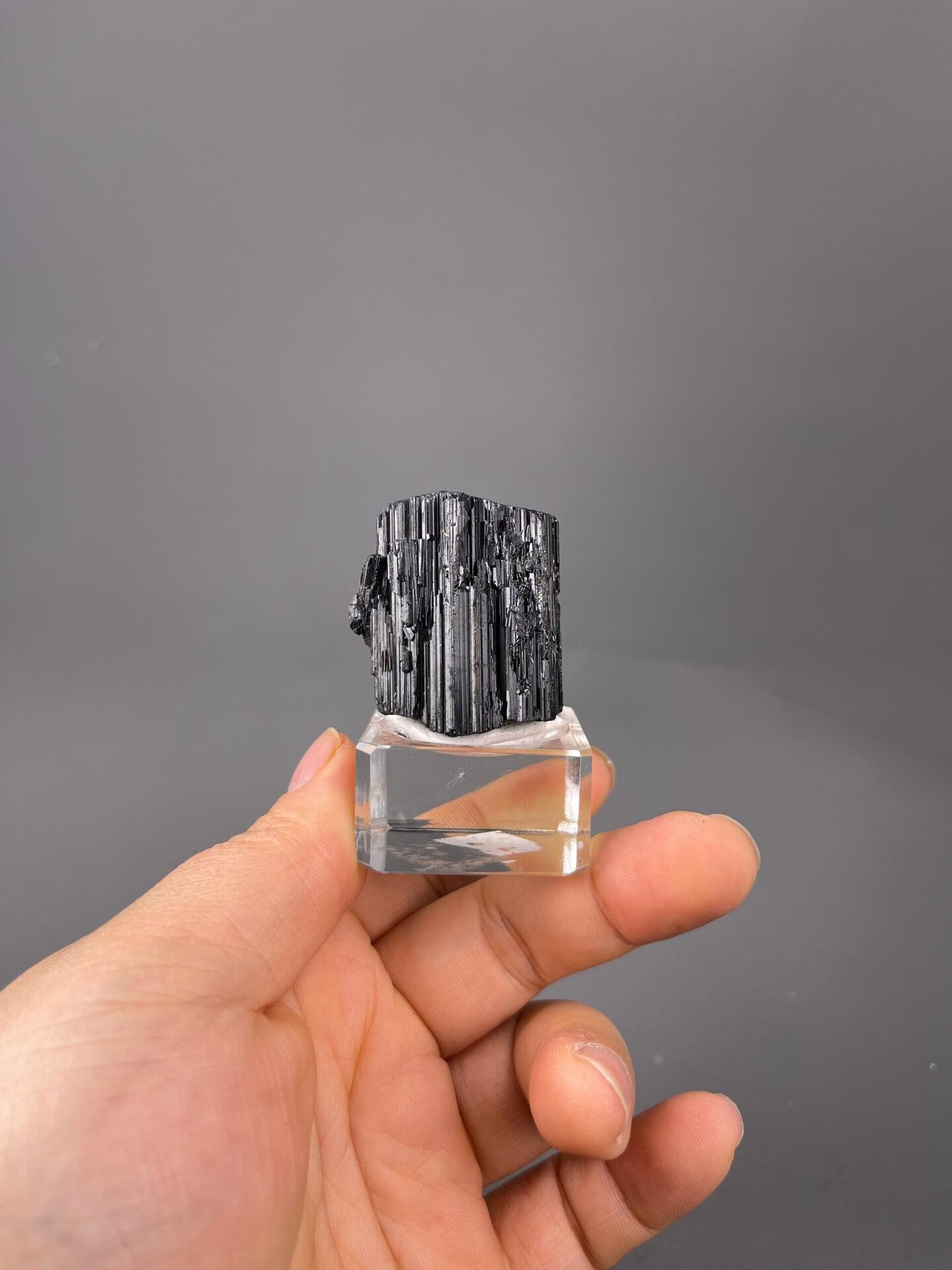 Close-up of striated black tourmaline crystal surfaces