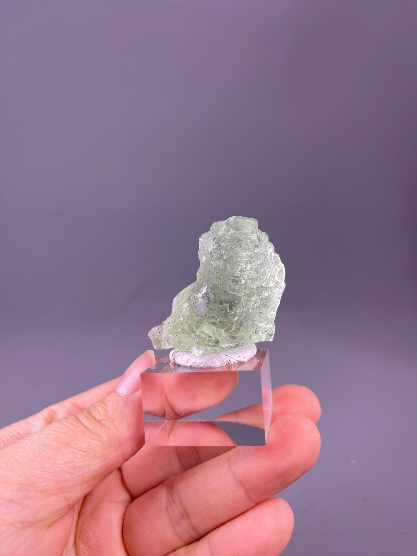 Sugar-texture quartz covering green fluorite surfaces