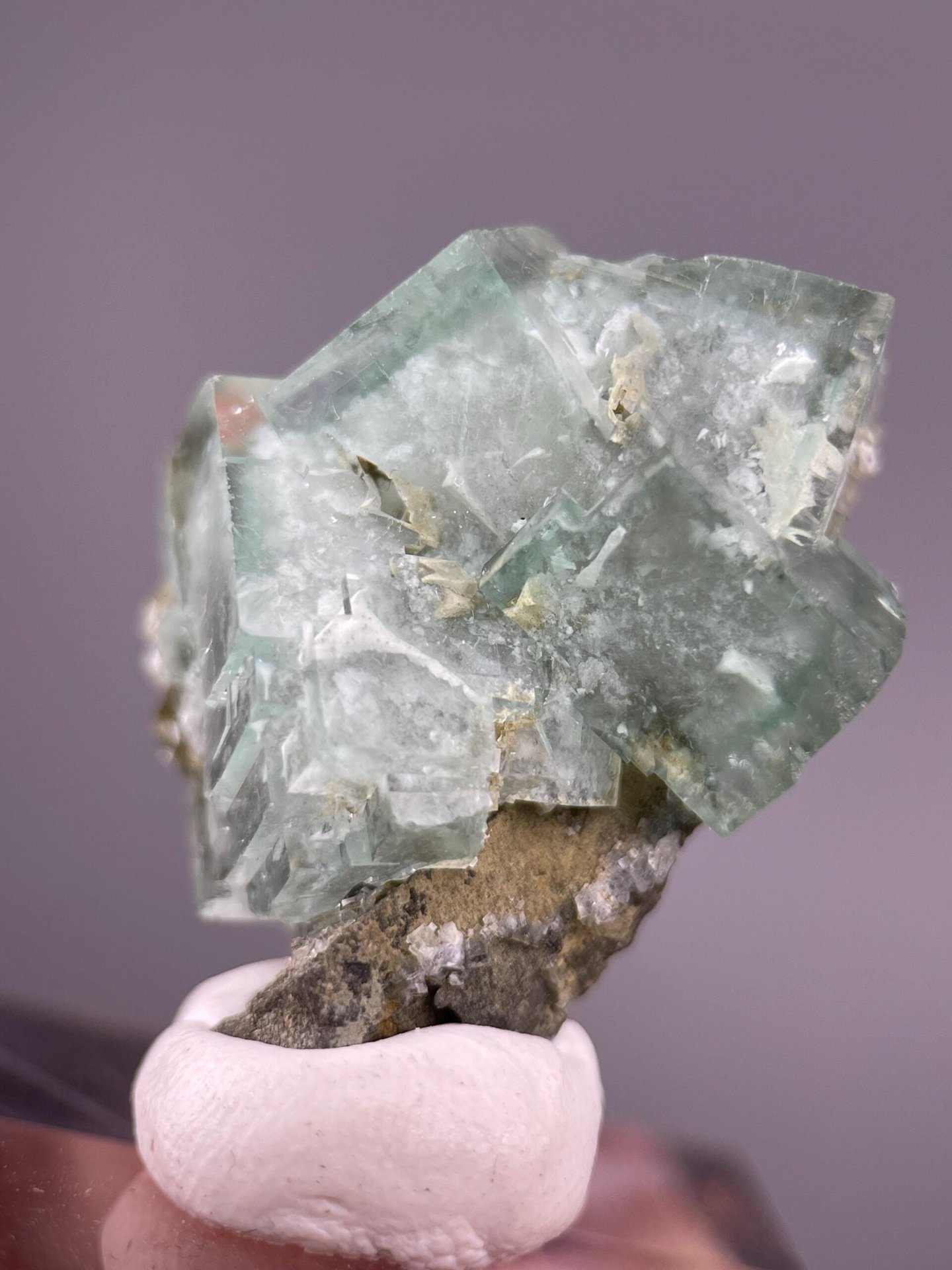 Back view of raw green fluorite crystal