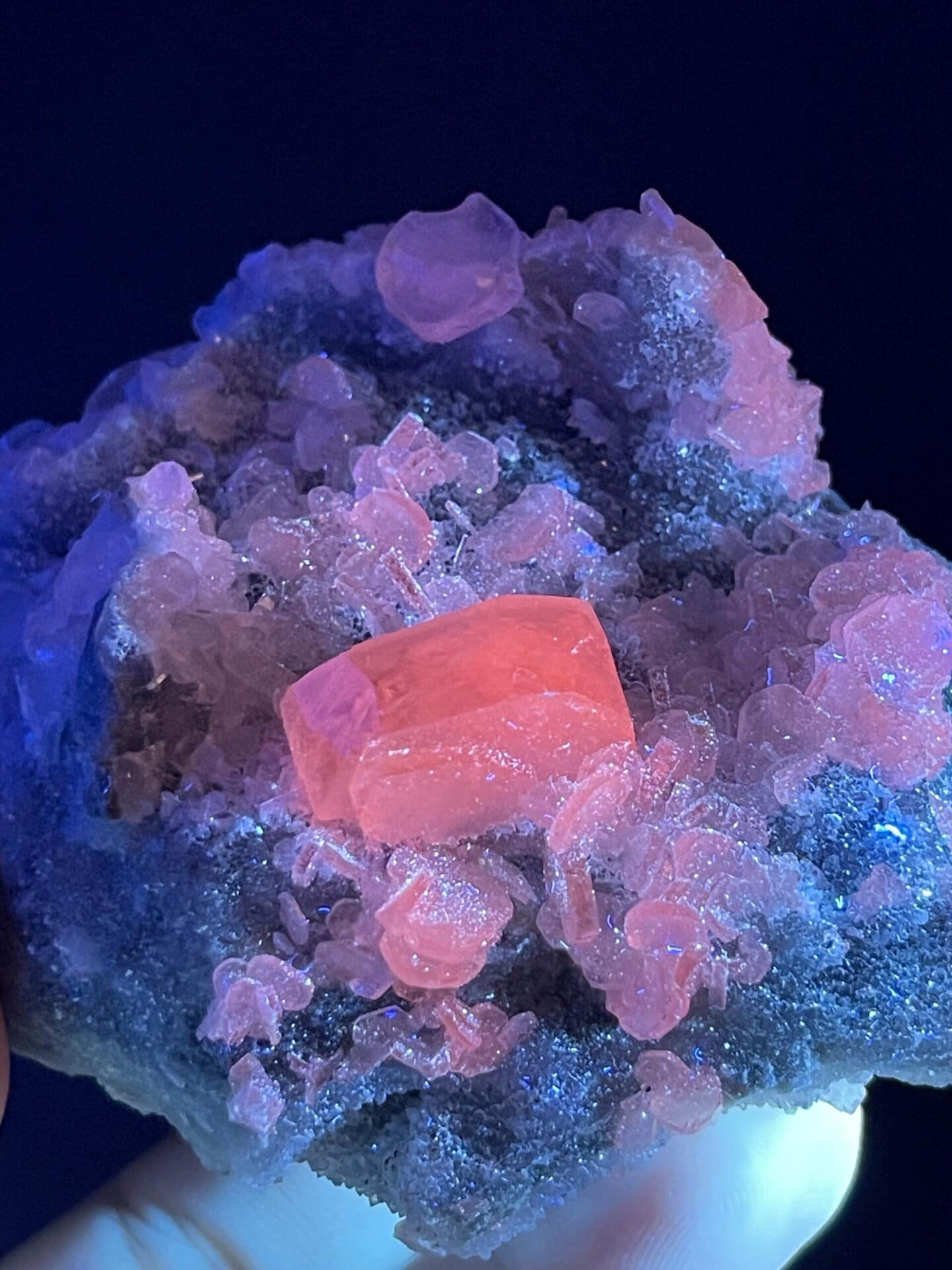 Back view of pink calcite cluster base