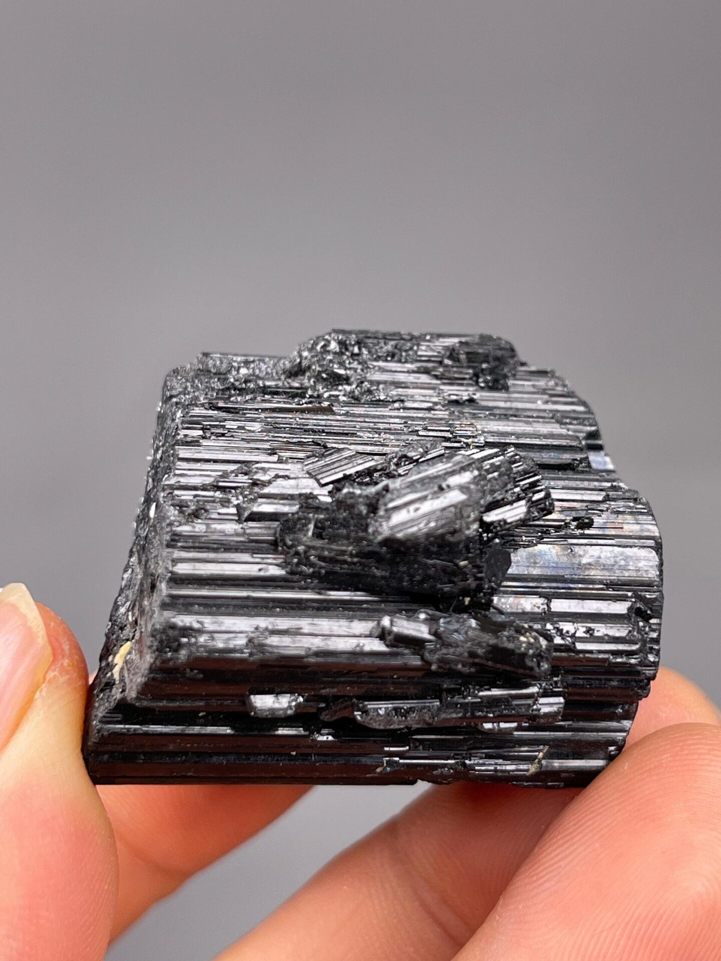 Back view of black tourmaline cluster