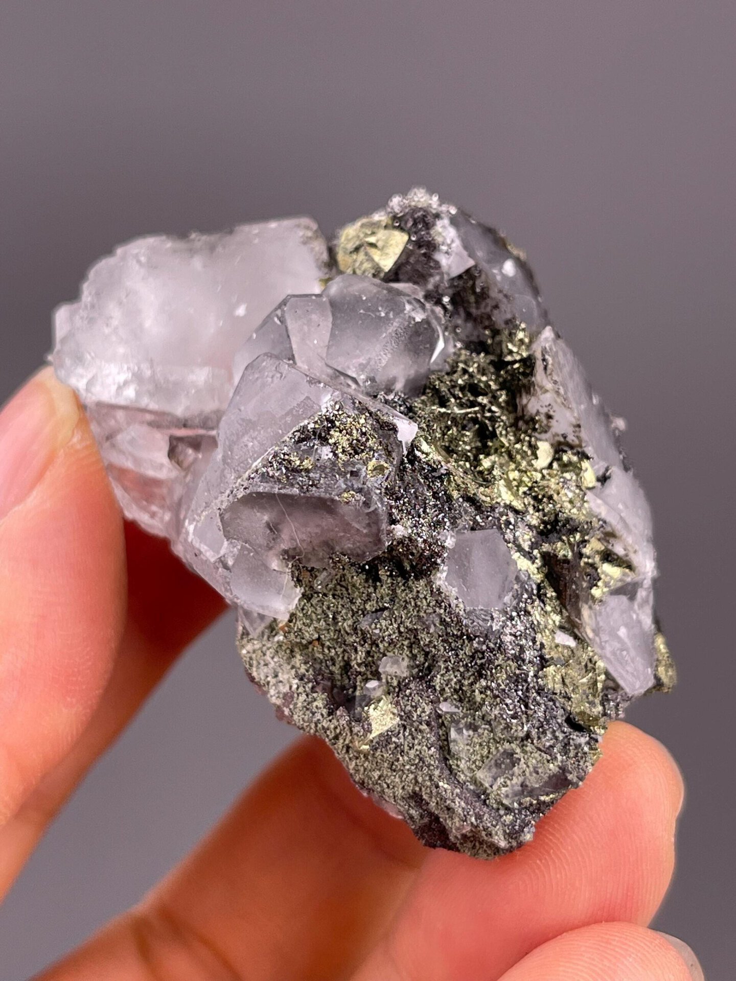 Vitreous luster on clear fluorite crystal faces