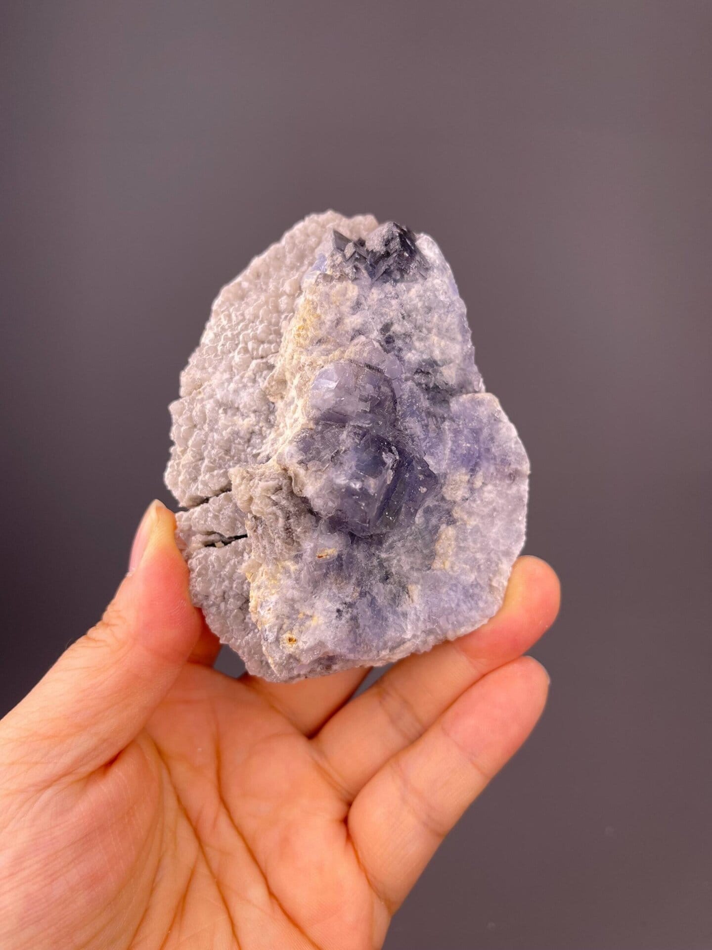 Front view of tanzanite-blue fluorite cluster from Fujian