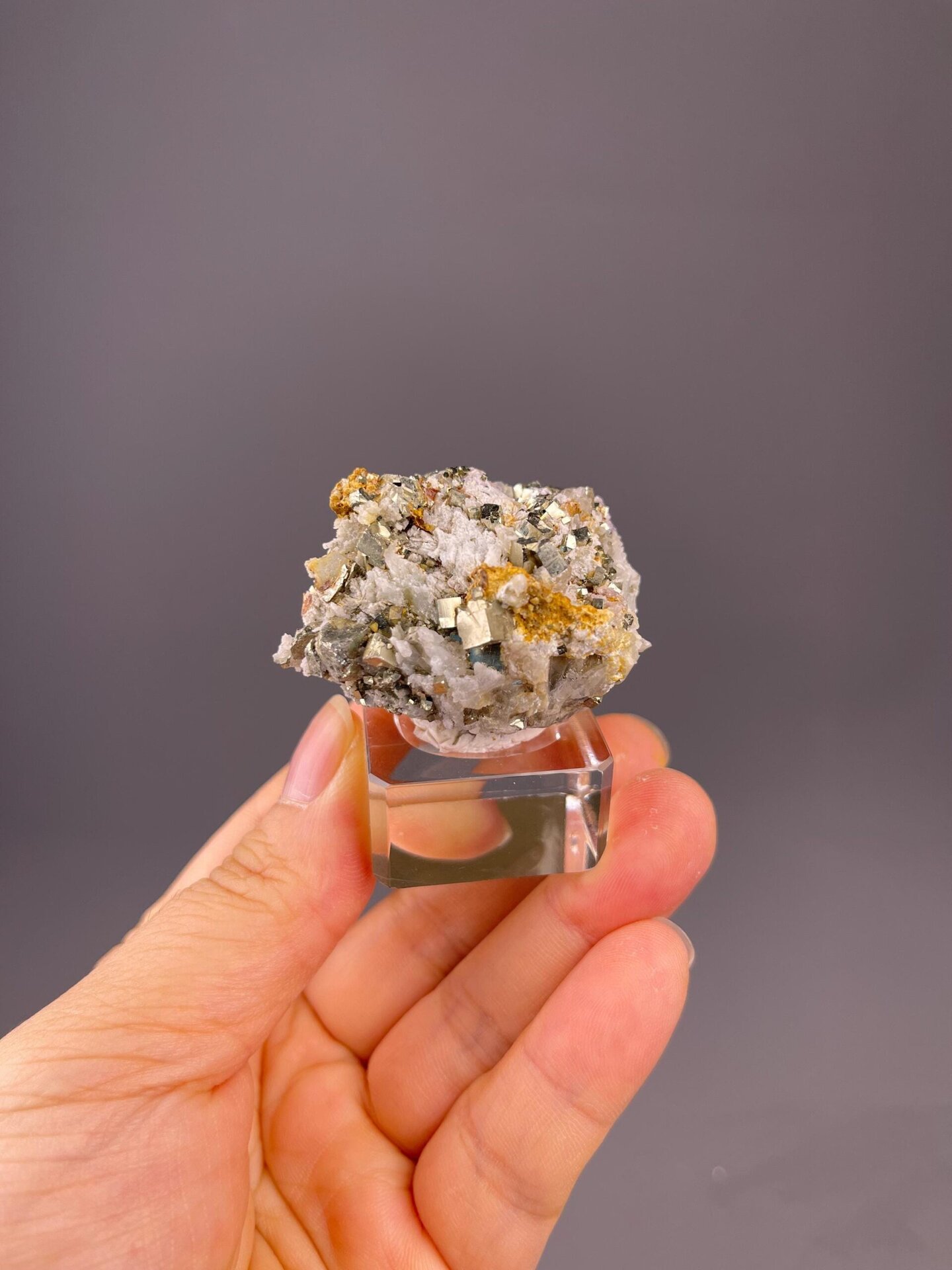 Close-up of sharp cubic pyrite crystal faces