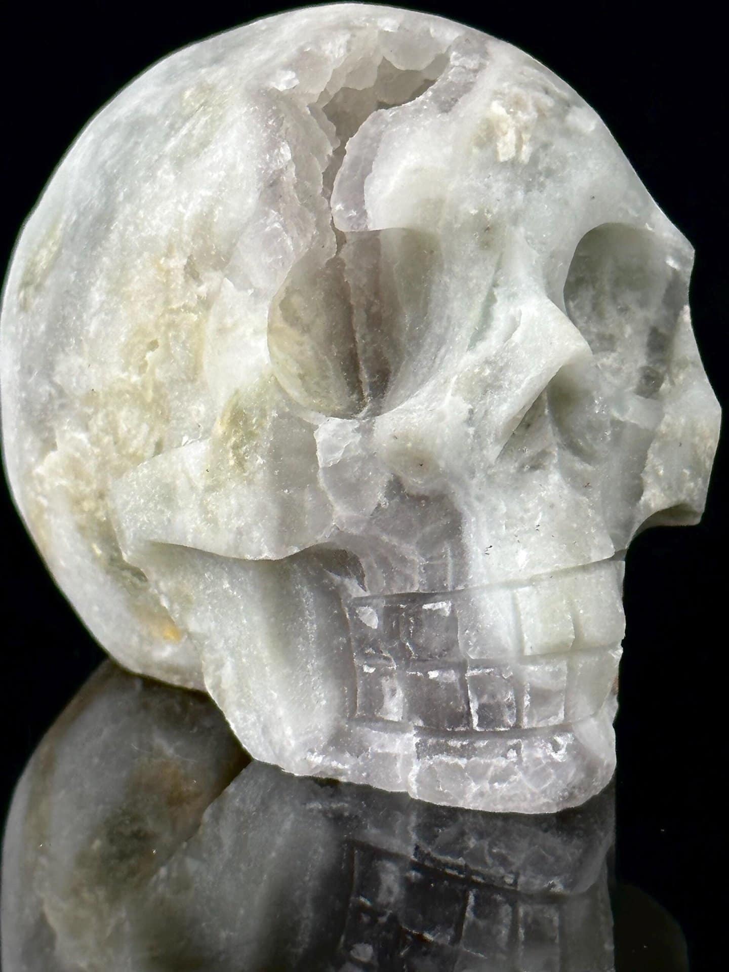 Side profile of carved fluorite skull from China