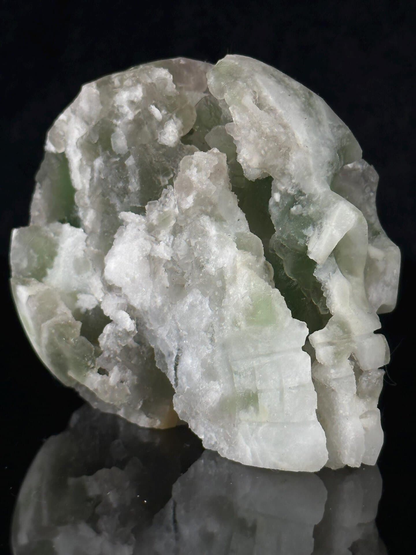 Close-up of green fluorite mineral texture on skull face