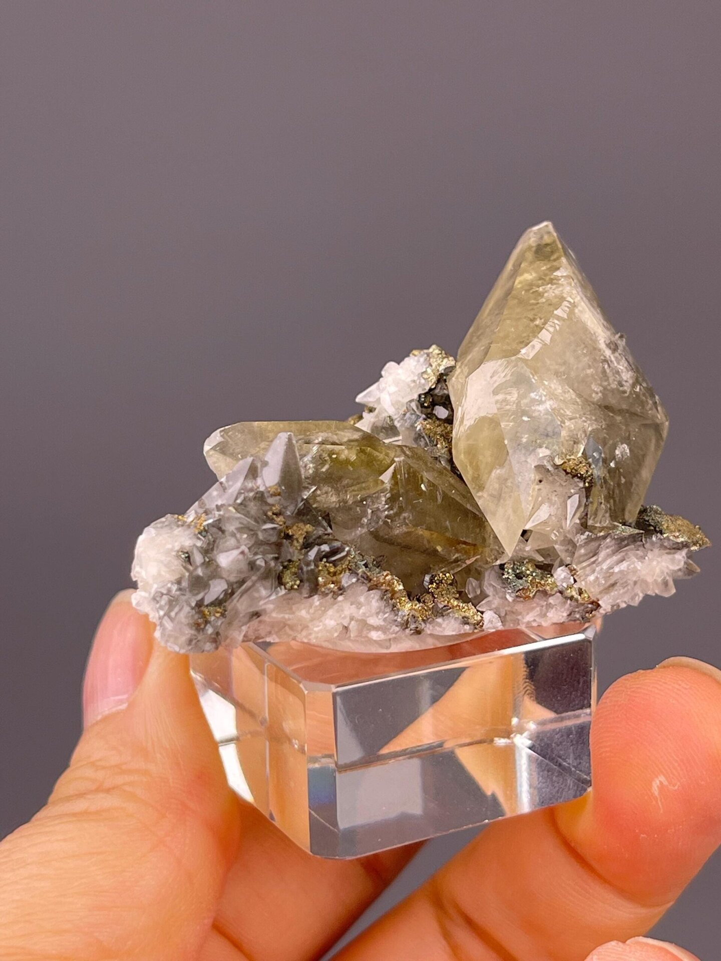 Close-up of metallic pyrite sparkle on calcite surface