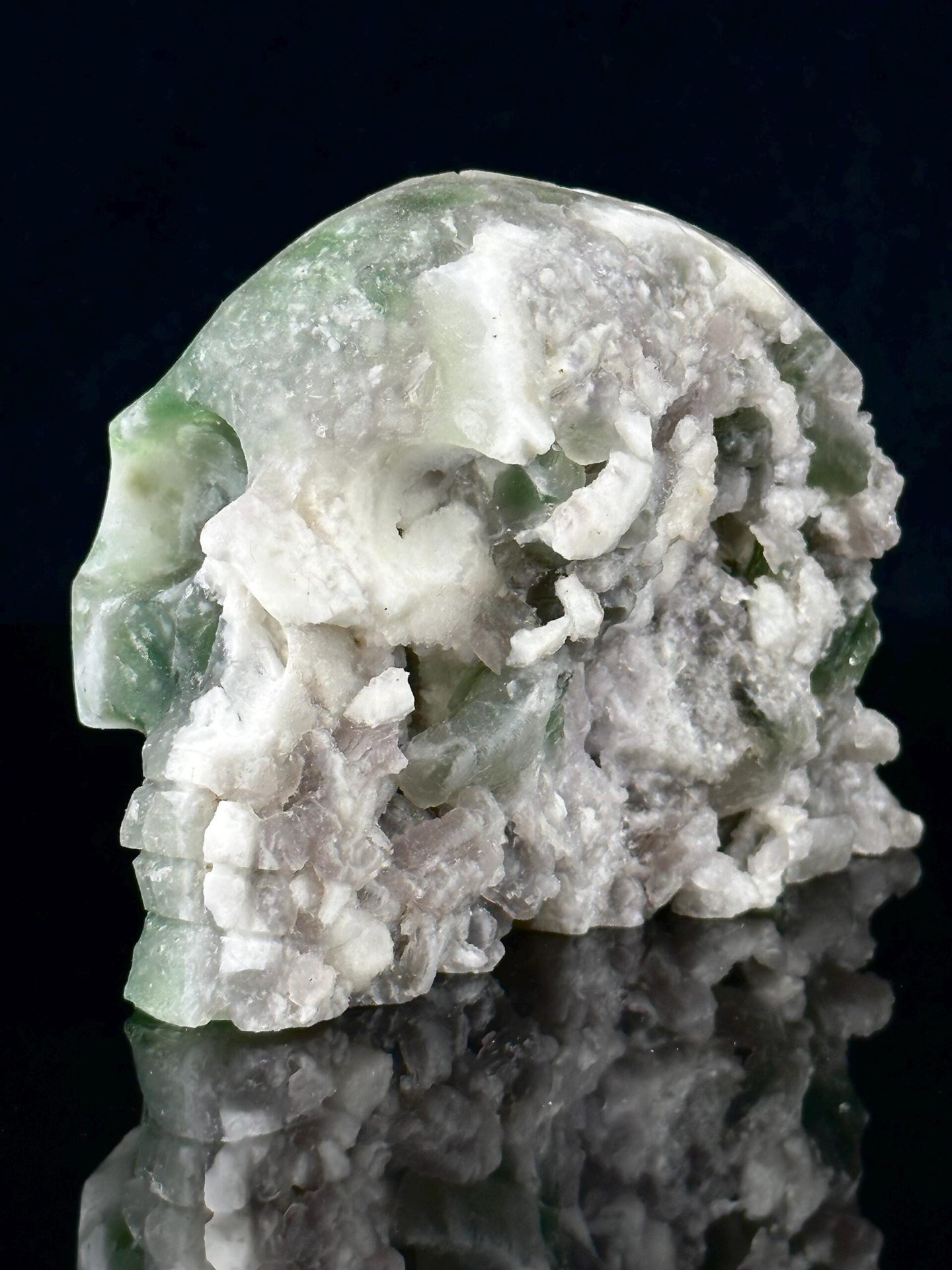 Side profile of large fluorite skull 5 inches wide