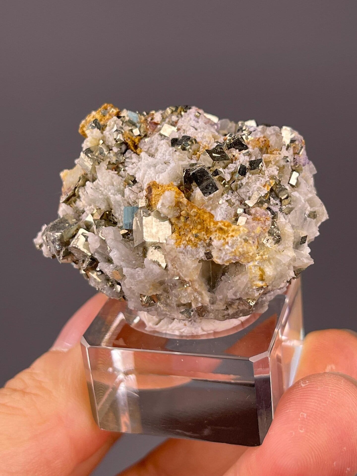 Mirror-like metallic luster on pyrite cube faces