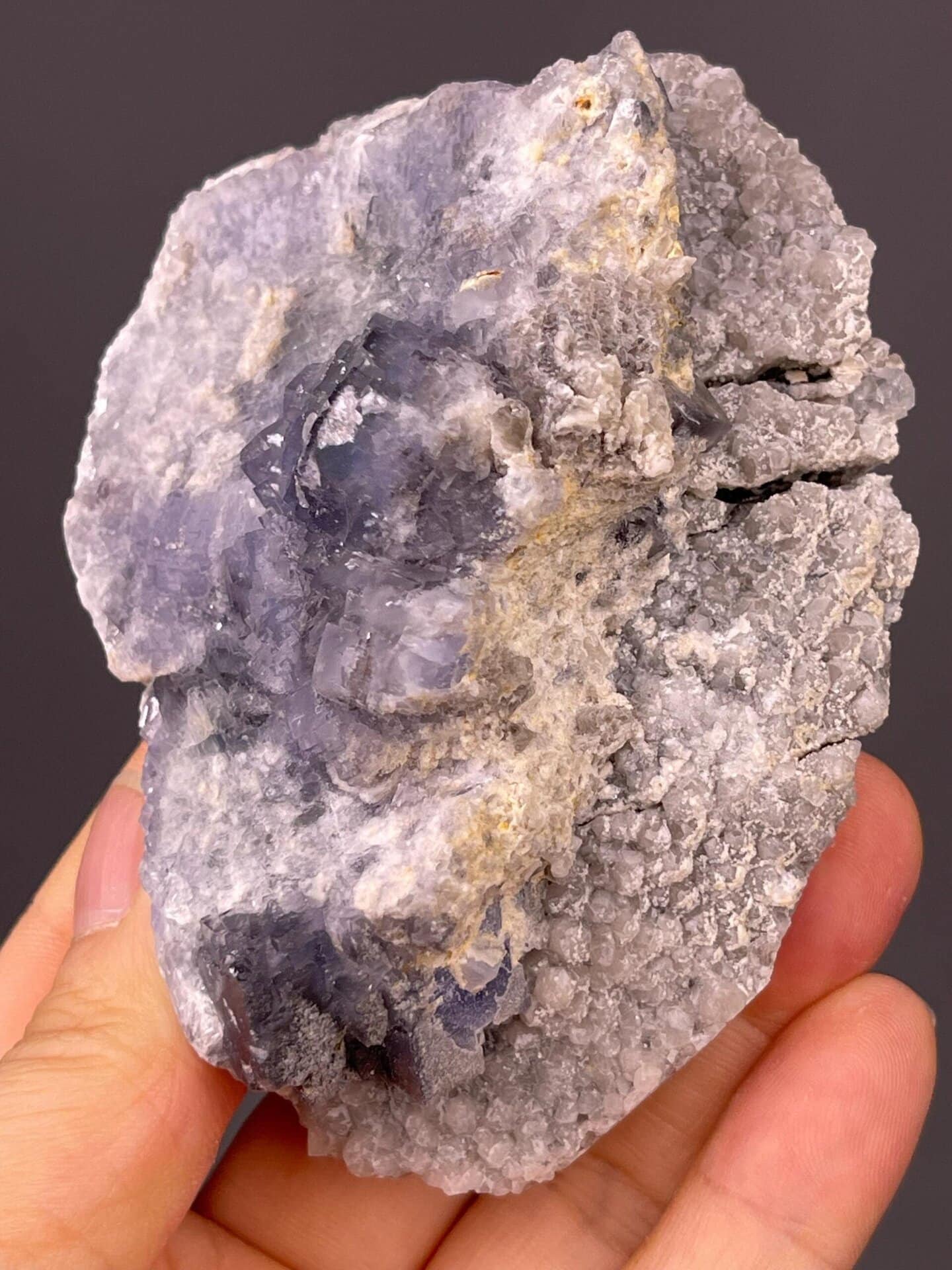 Fujian tanzanite-blue fluorite under studio lighting