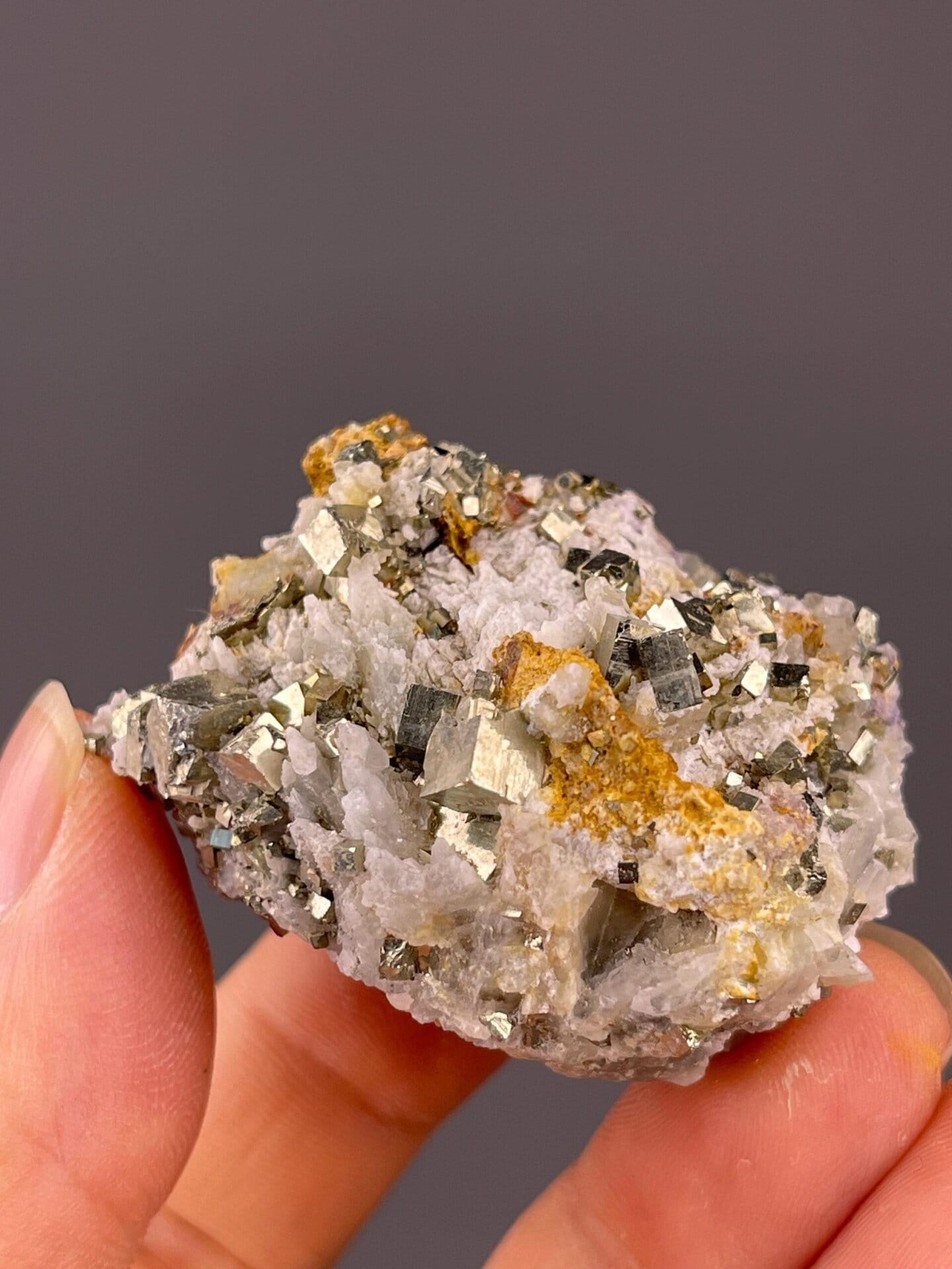 Multiple intergrown golden pyrite cubes