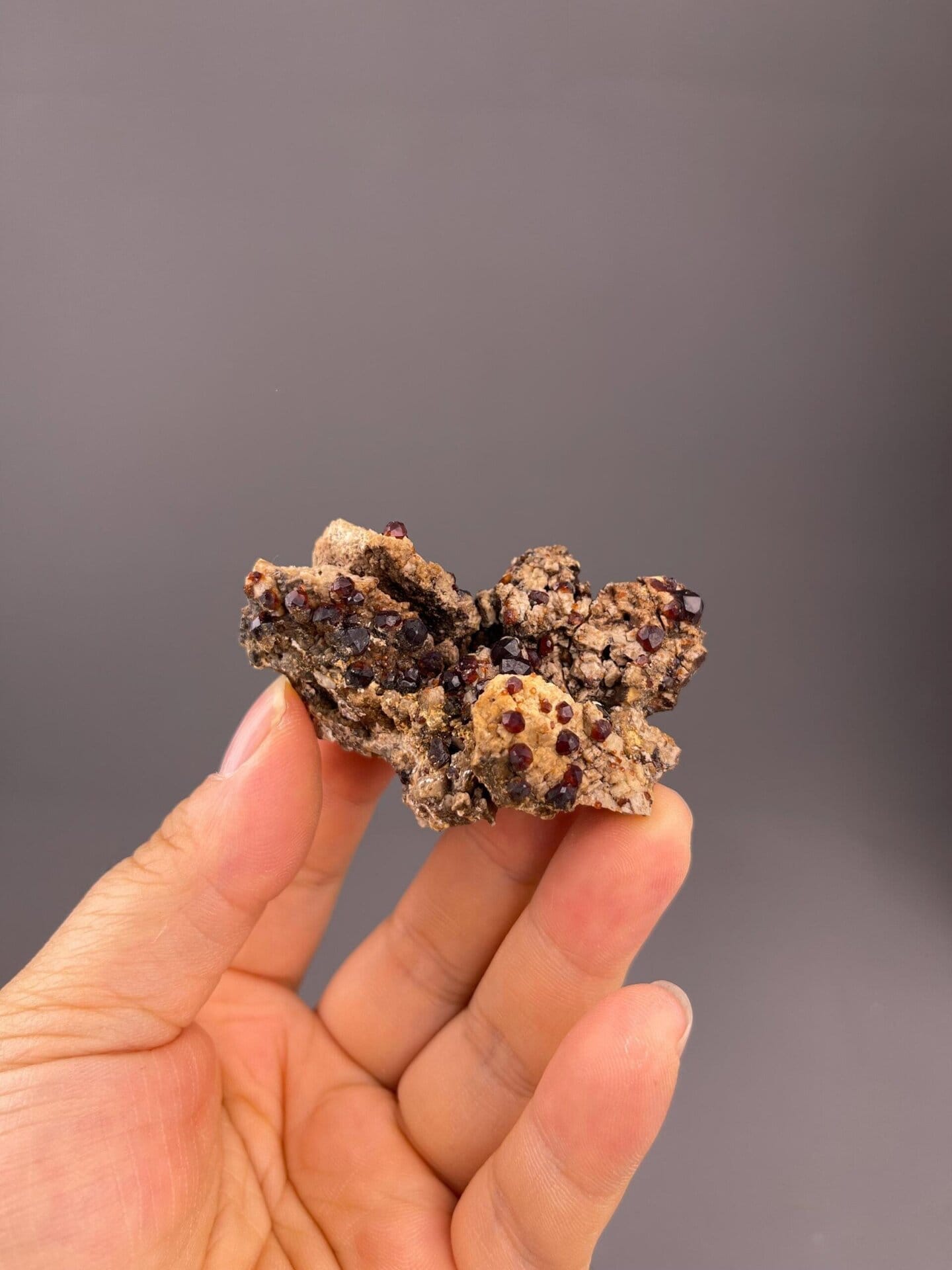 Close-up of dodecahedral garnet crystal faces