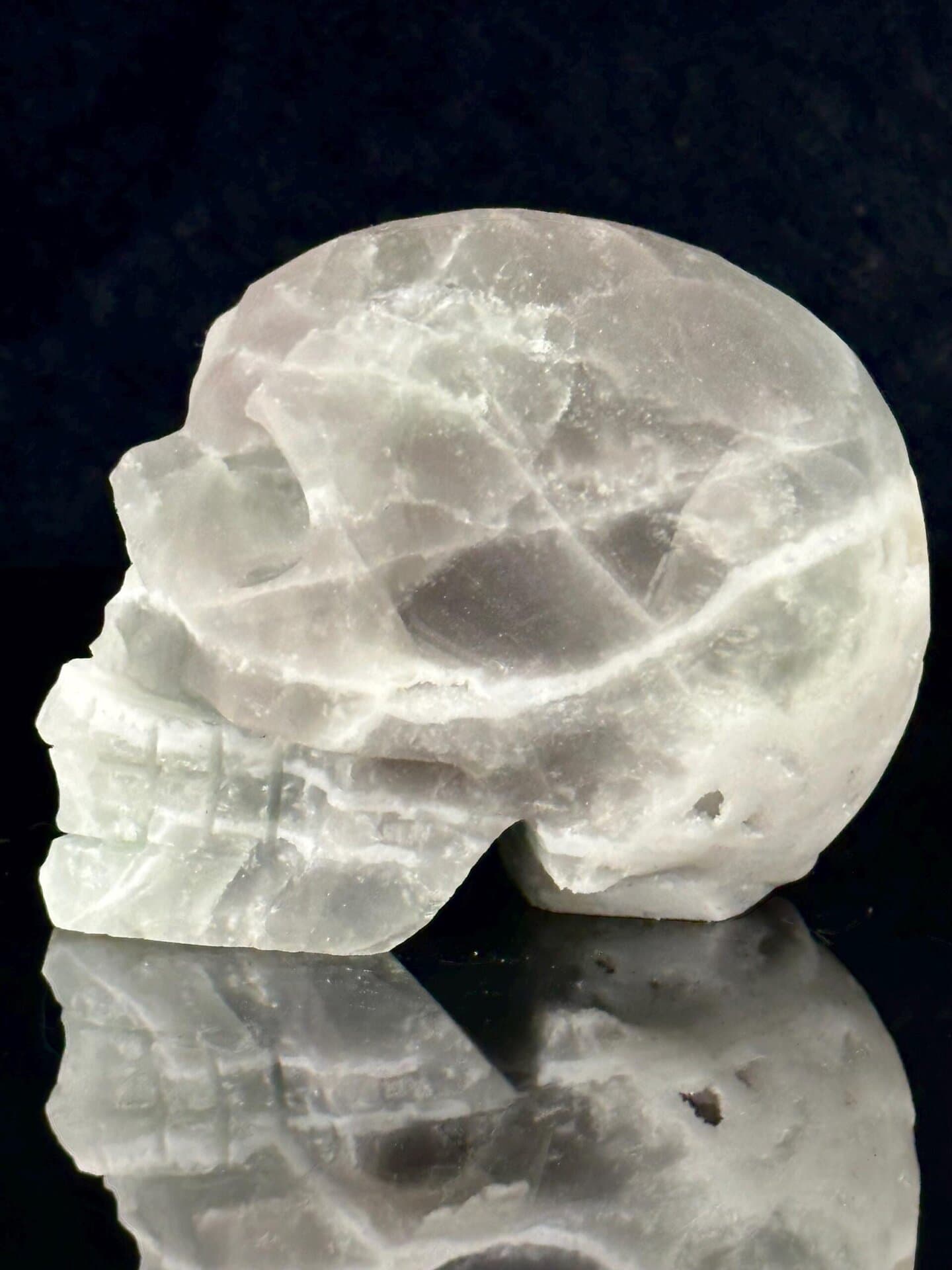 Raw quartz geode interior of fluorite skull